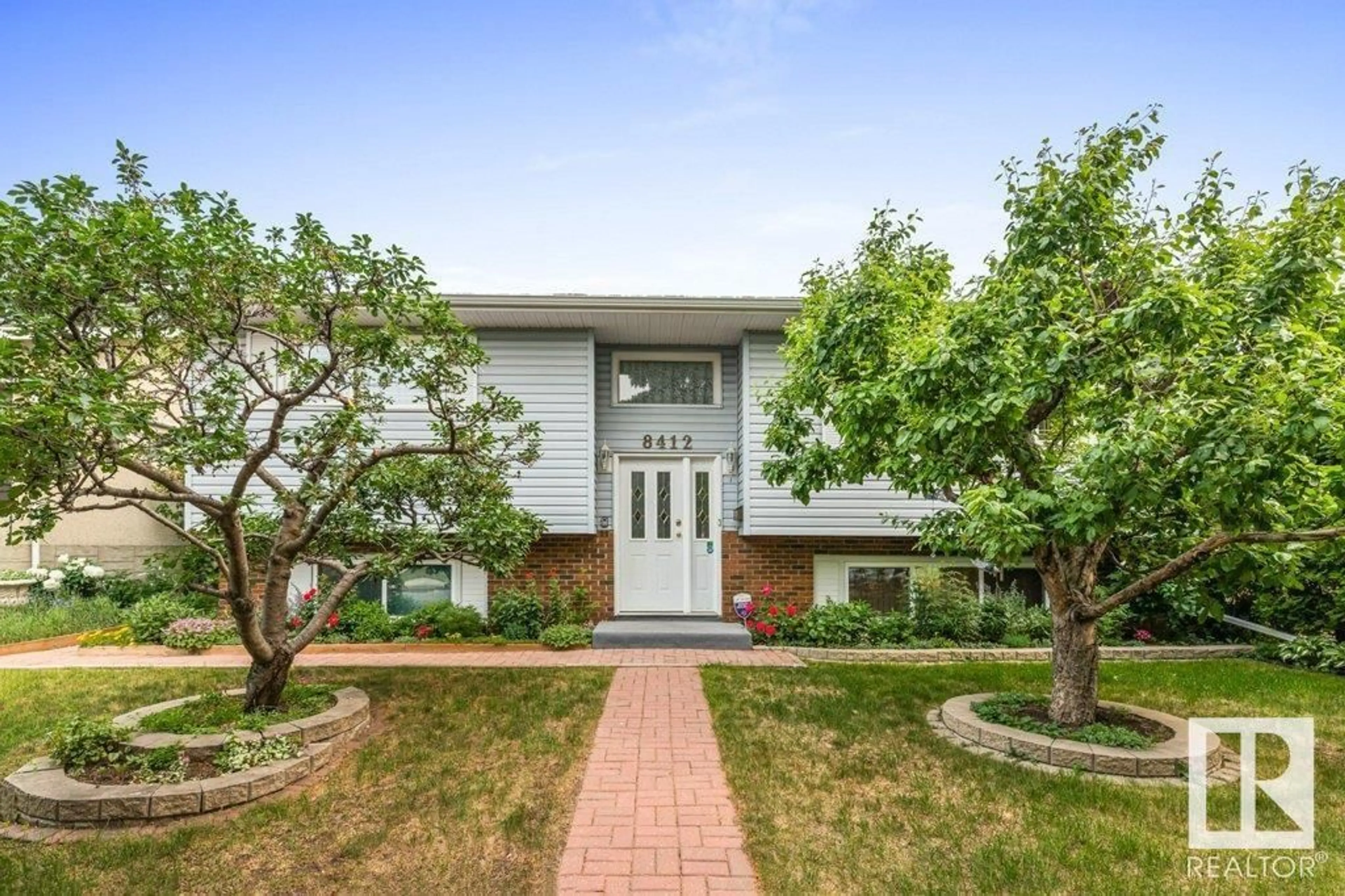 Home with brick exterior material, street for 8412 149A AV, Edmonton Alberta T5E2Z2
