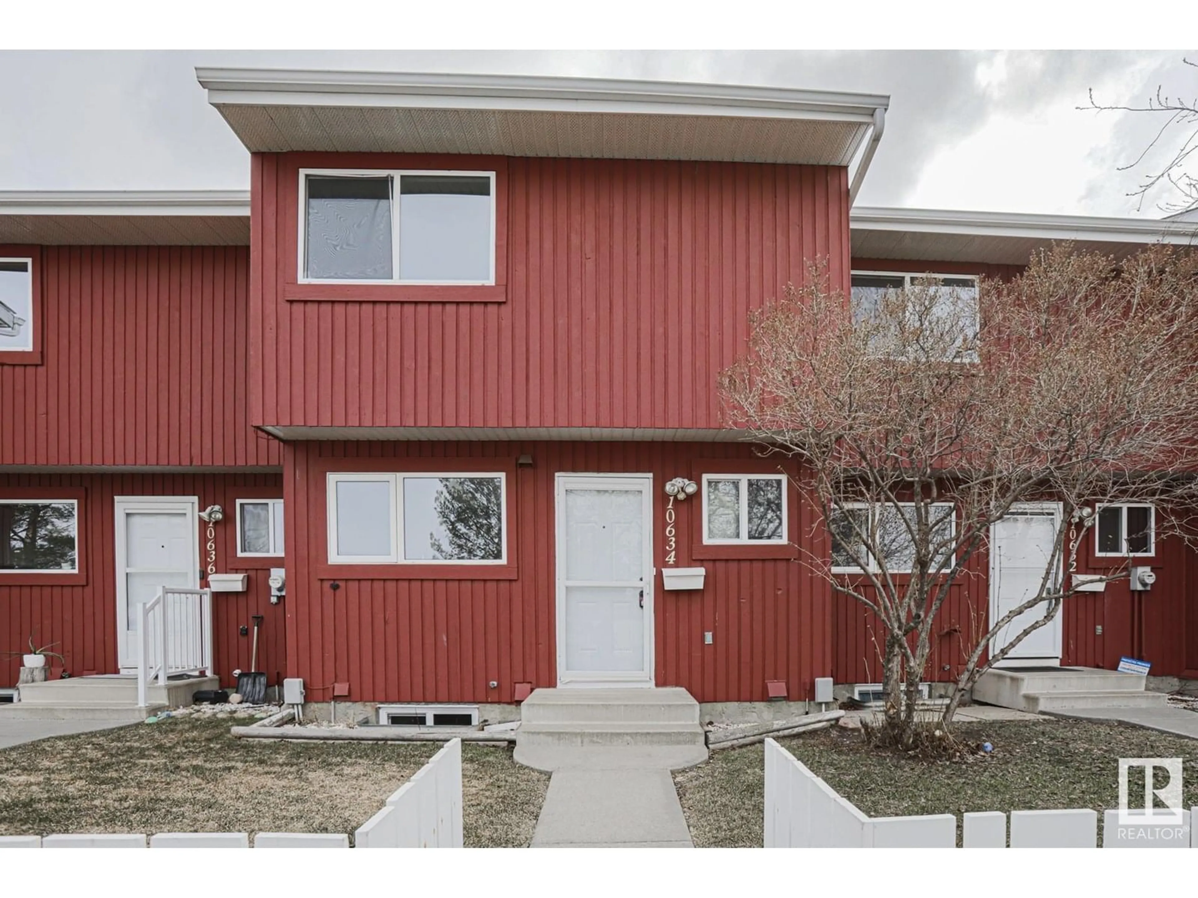 Home with vinyl exterior material, street for 10634 BEAUMARIS RD, Edmonton Alberta T5X3N4