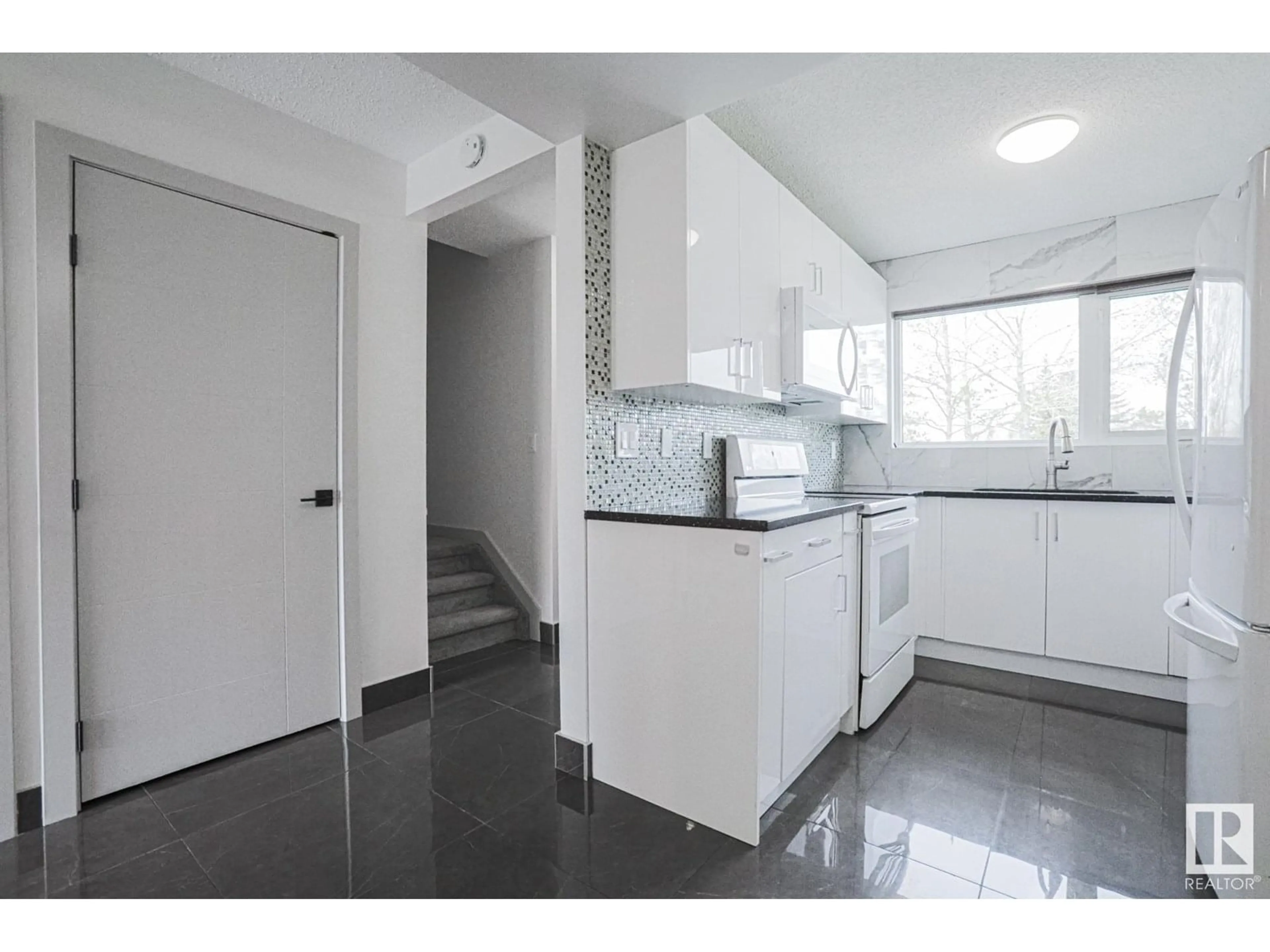 Standard kitchen, unknown for 10634 BEAUMARIS RD, Edmonton Alberta T5X3N4