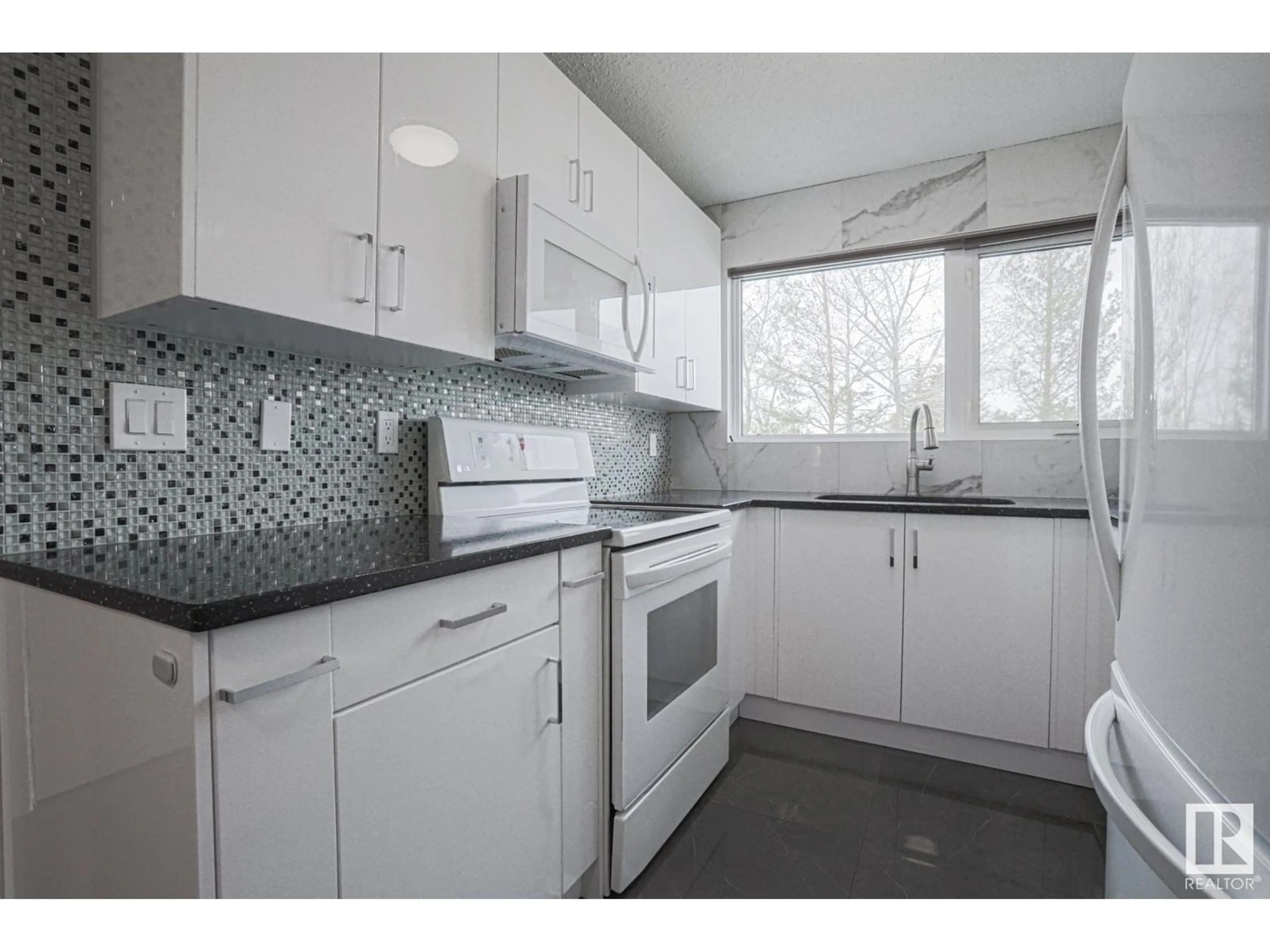 Standard kitchen, unknown for 10634 BEAUMARIS RD, Edmonton Alberta T5X3N4