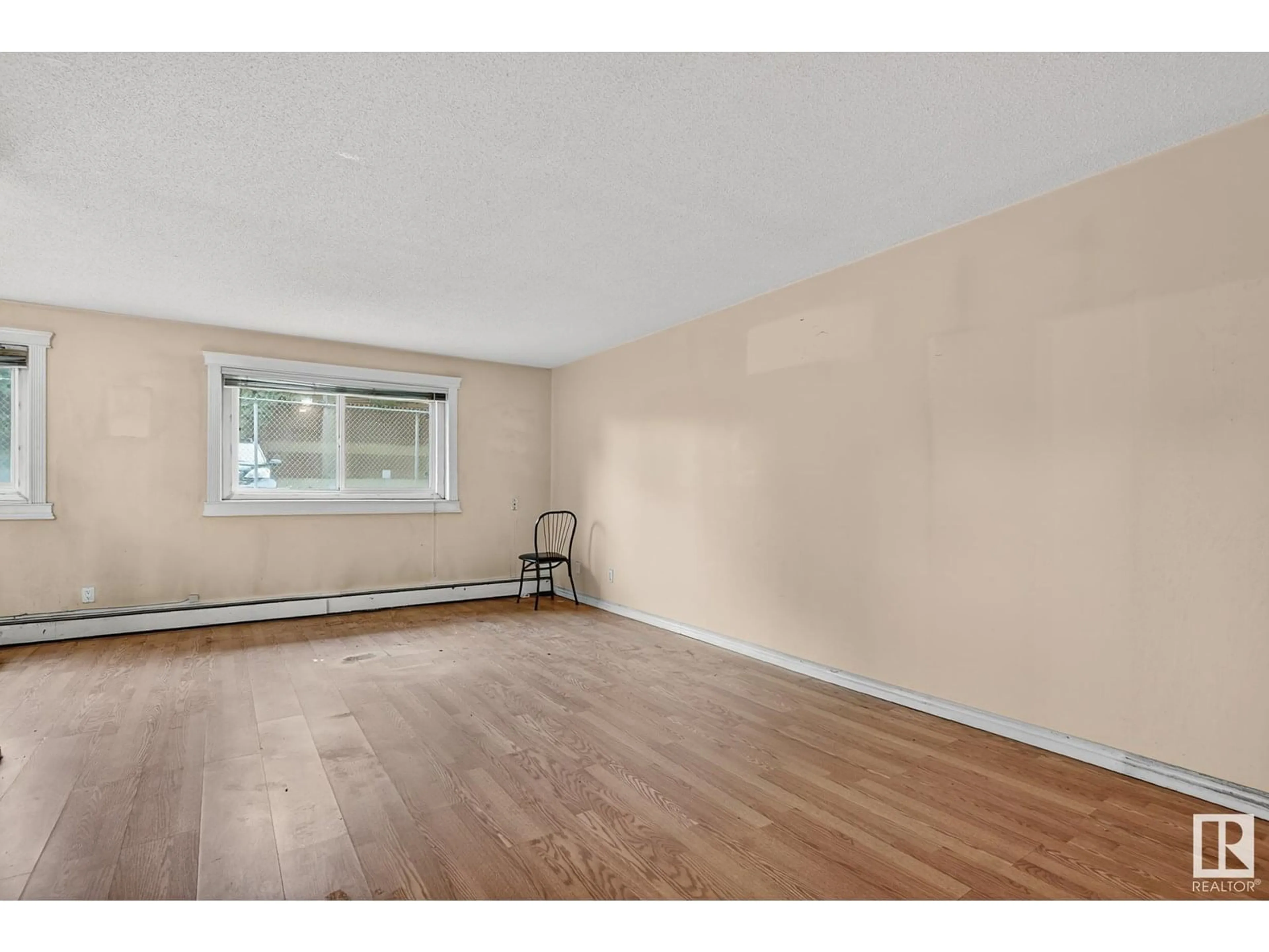 A pic of a room for #107 - 7204 81 AV, Edmonton Alberta T6B0E2