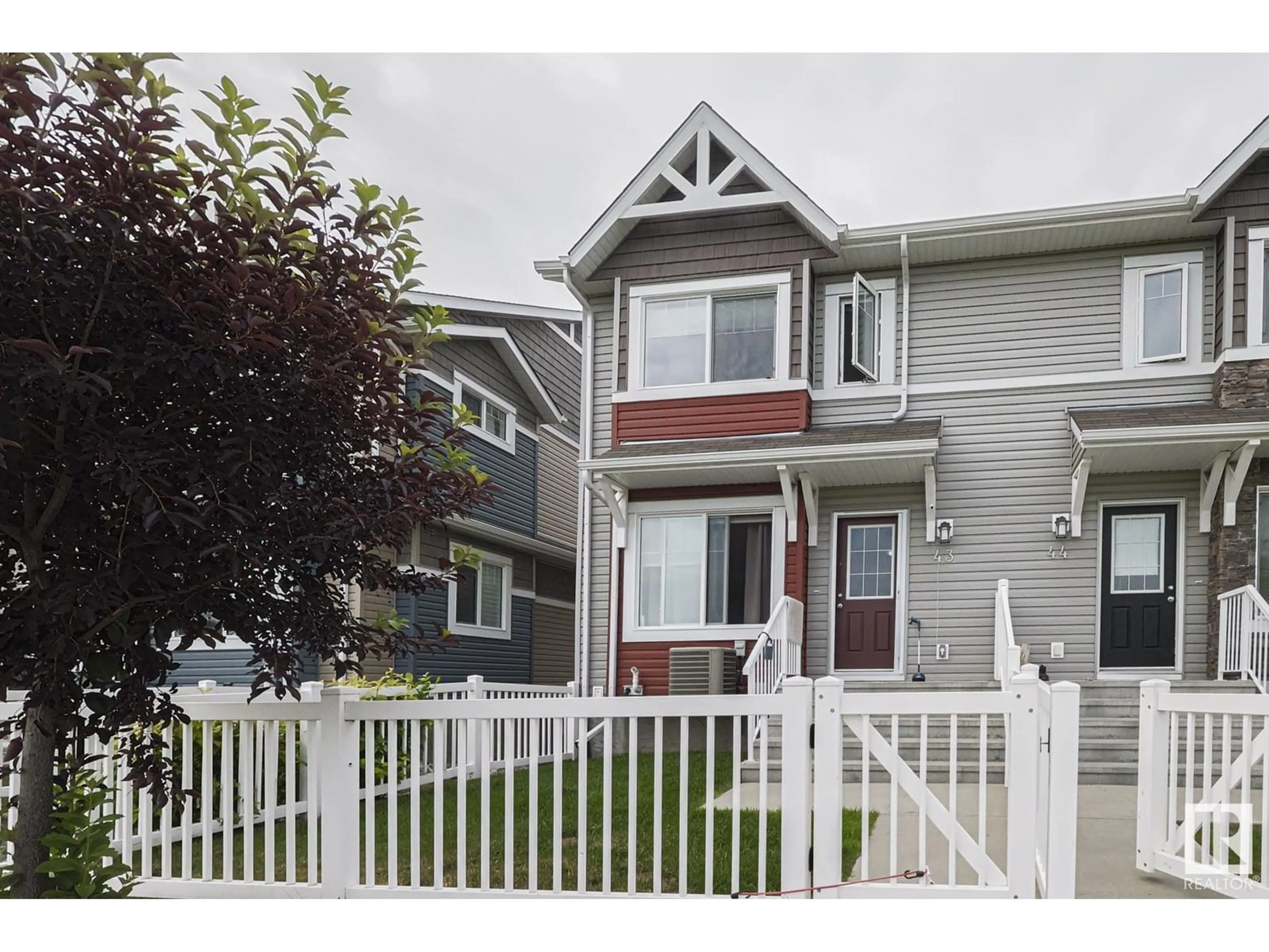 Home with vinyl exterior material, street for #43 - 14621 121 ST, Edmonton Alberta T5X0H2