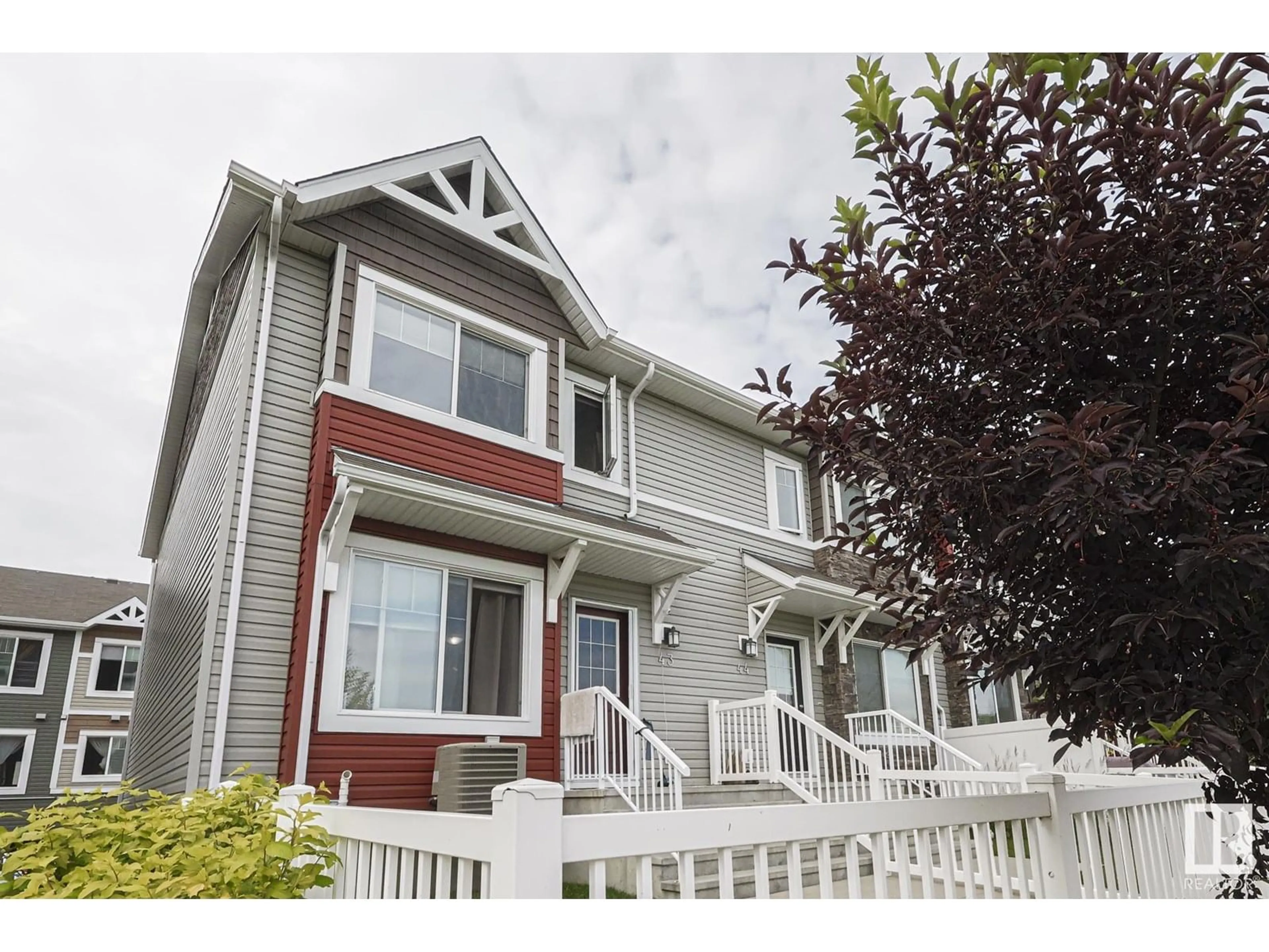 Home with vinyl exterior material, street for #43 - 14621 121 ST, Edmonton Alberta T5X0H2
