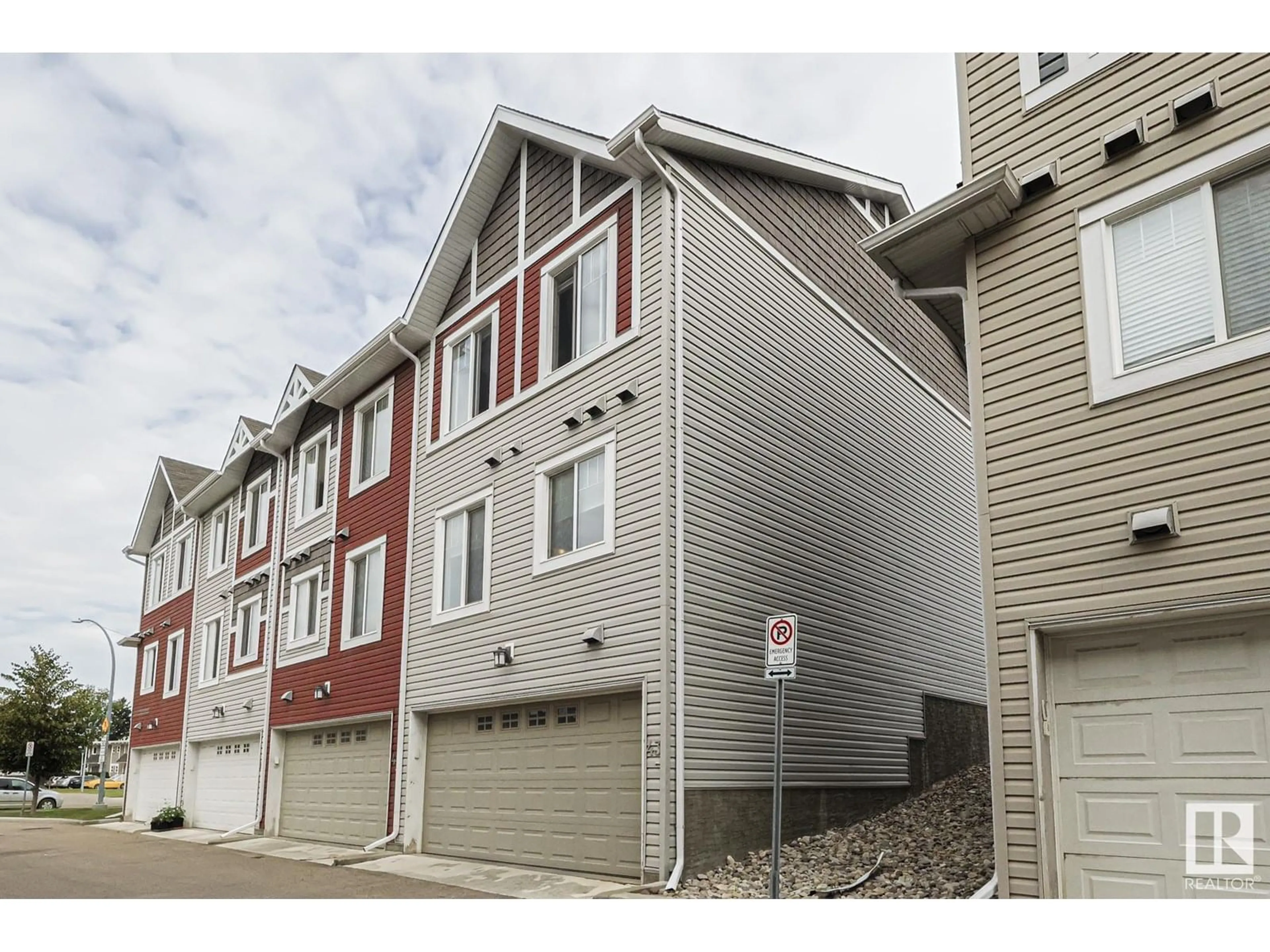 Home with vinyl exterior material, street for #43 - 14621 121 ST, Edmonton Alberta T5X0H2