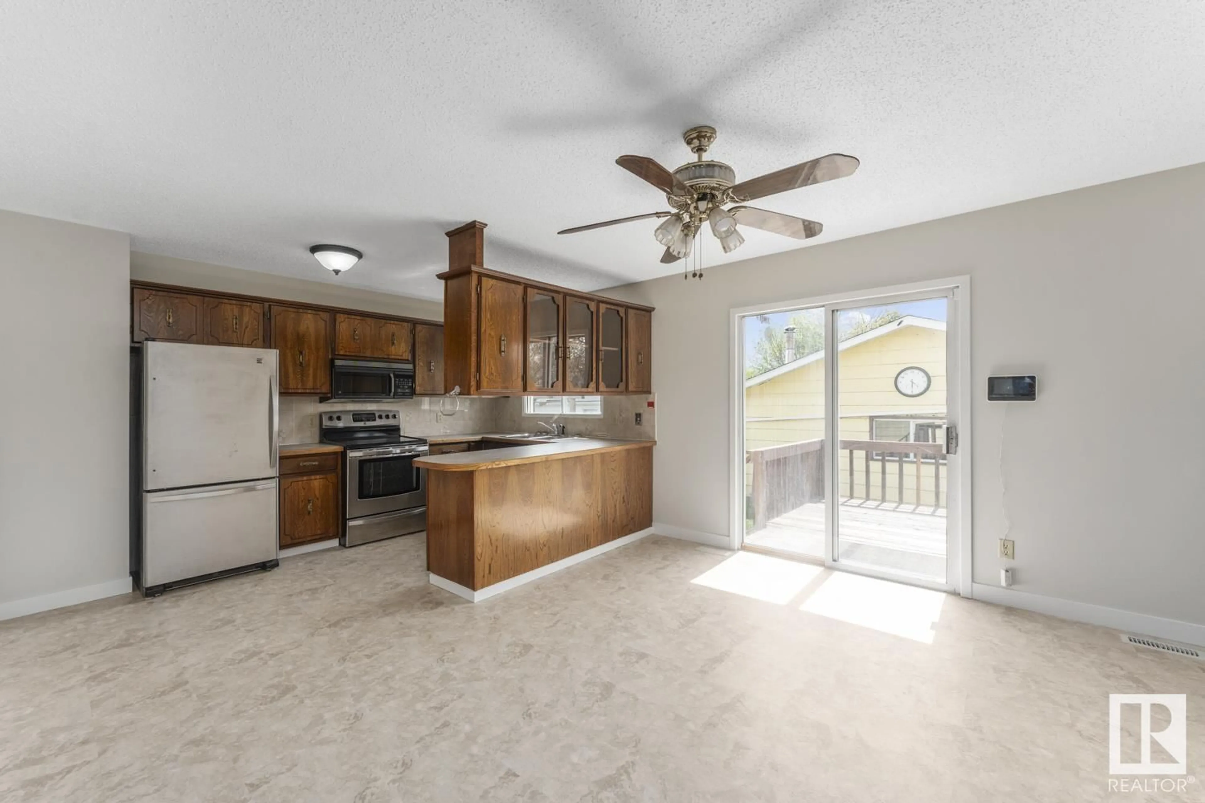 Open concept kitchen, ceramic/tile floor for 4316 45 AV, Bonnyville Town Alberta T9N1X2