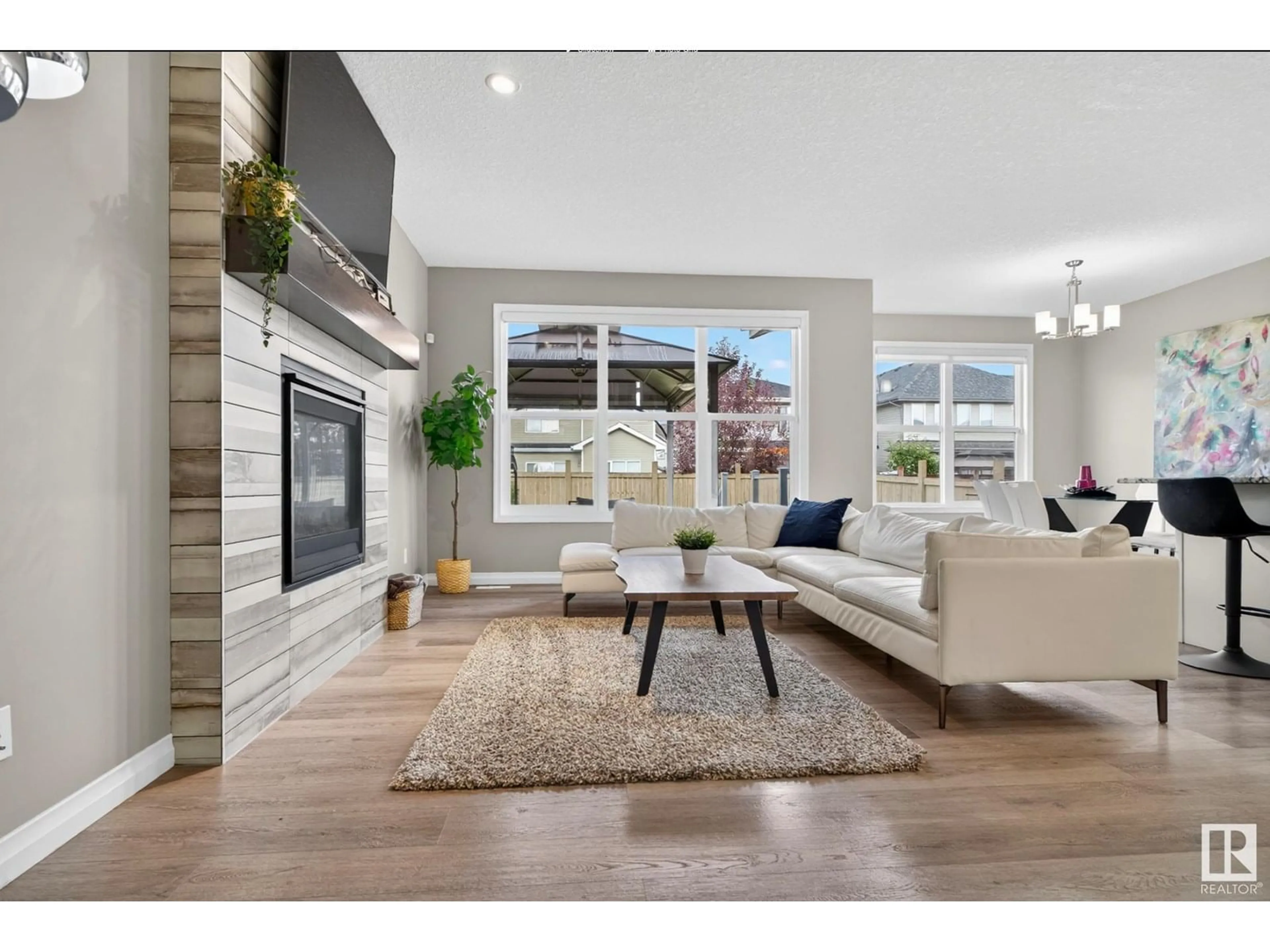 Living room with furniture, wood/laminate floor for SQ SW - 5504 ALLBRIGHT SQUARE, Edmonton Alberta T6W3V1