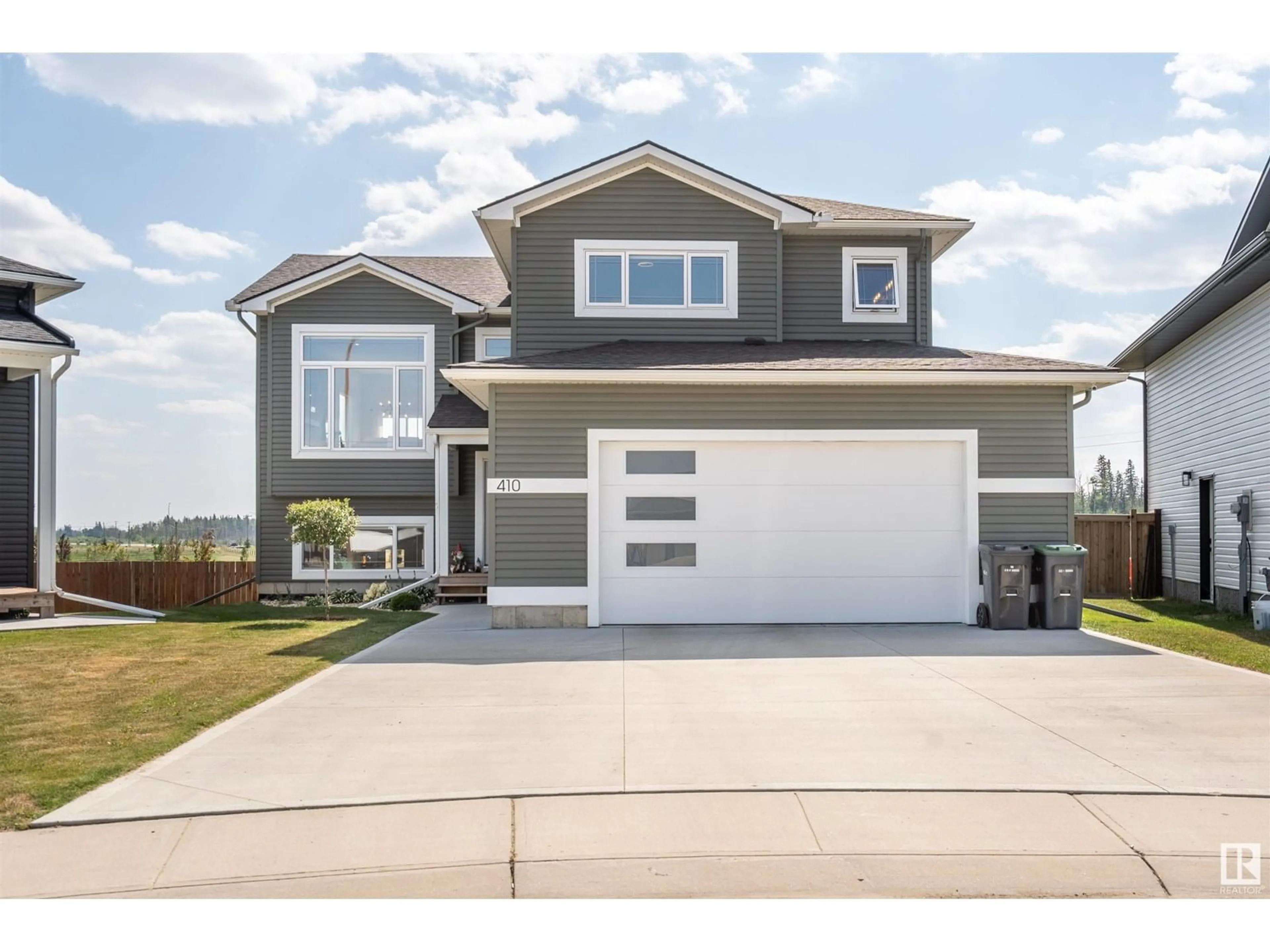 Home with vinyl exterior material, street for 410 LAKEWOOD WY, Cold Lake Alberta T9M0K7