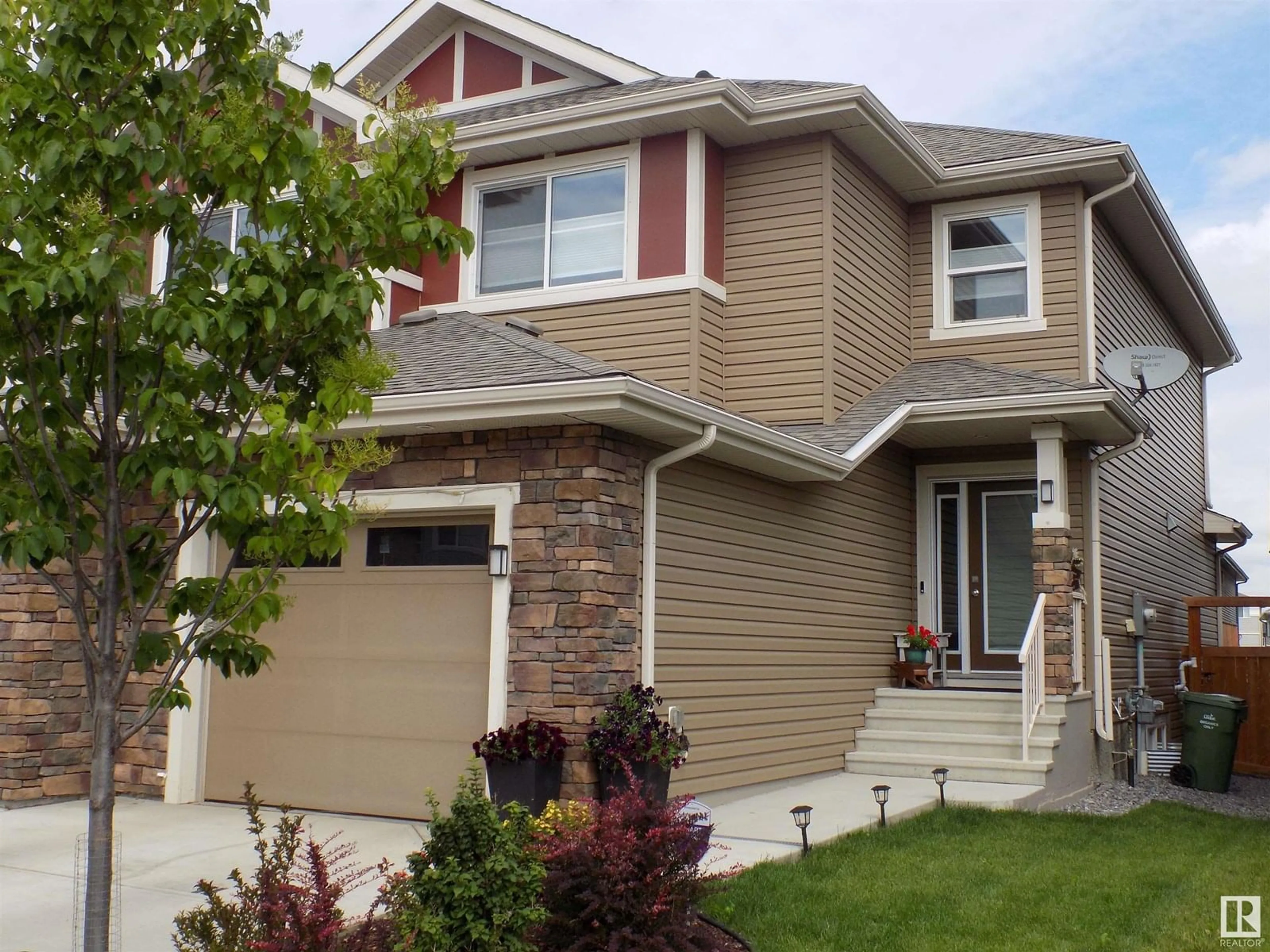 Home with vinyl exterior material, street for 244 LARCH CRESCENT, Leduc Alberta T9E1L3