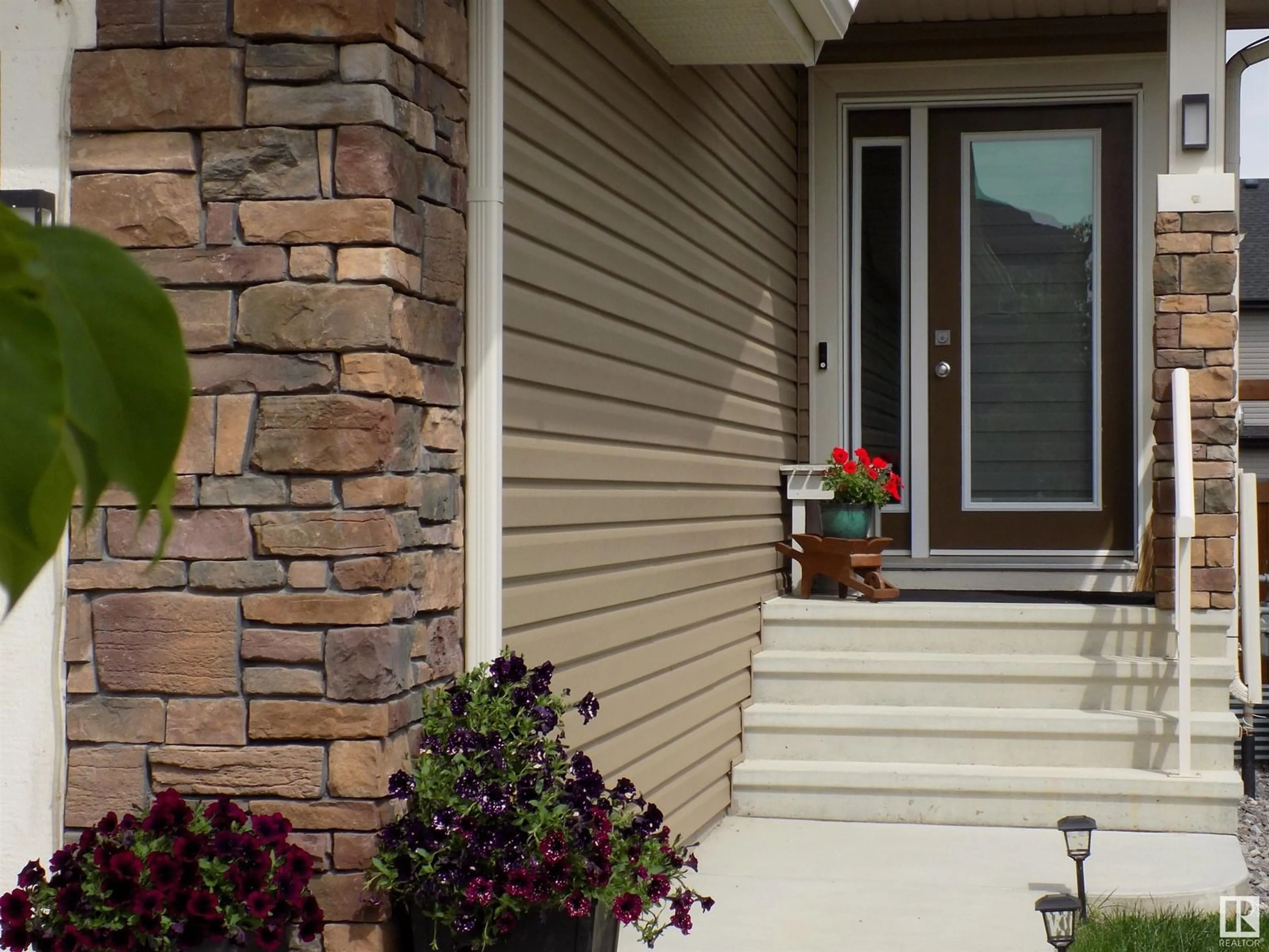 Home with vinyl exterior material, street for 244 LARCH CRESCENT, Leduc Alberta T9E1L3
