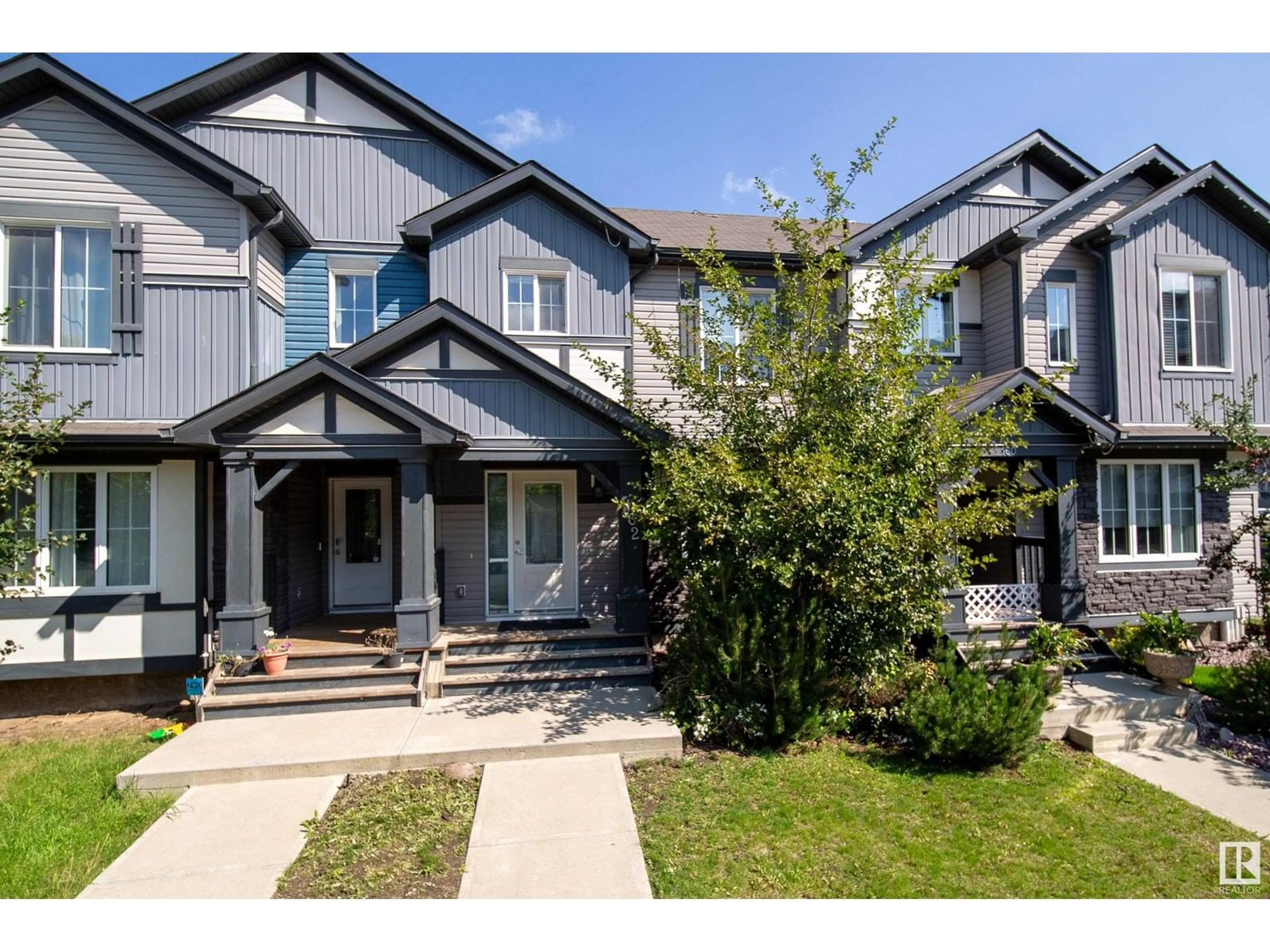 Home with vinyl exterior material, street for 162 DESROCHERS GA, Edmonton Alberta T6W3H8