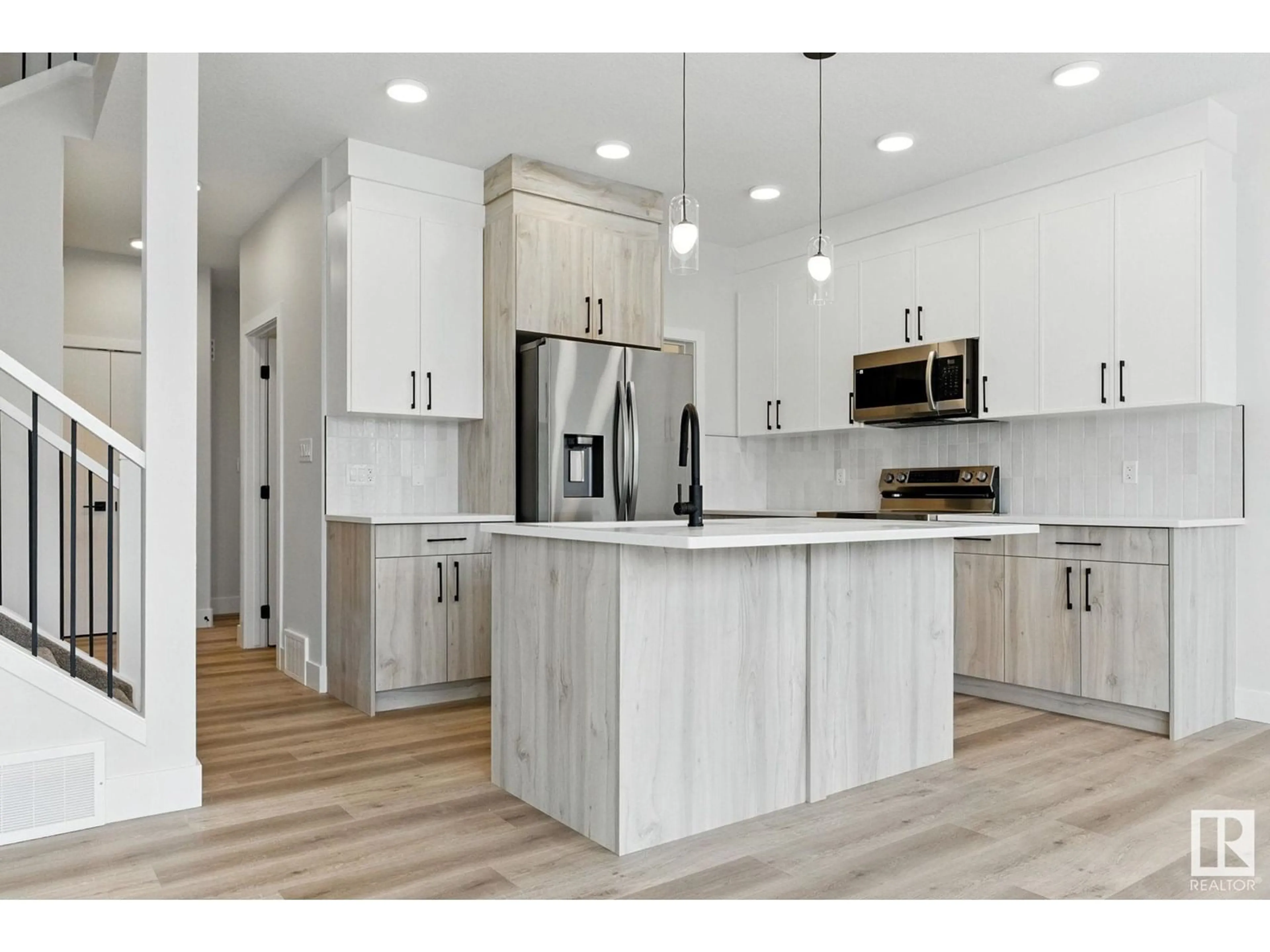 Open concept kitchen, unknown for NW - 8831 181 AV, Edmonton Alberta T5Z0X4