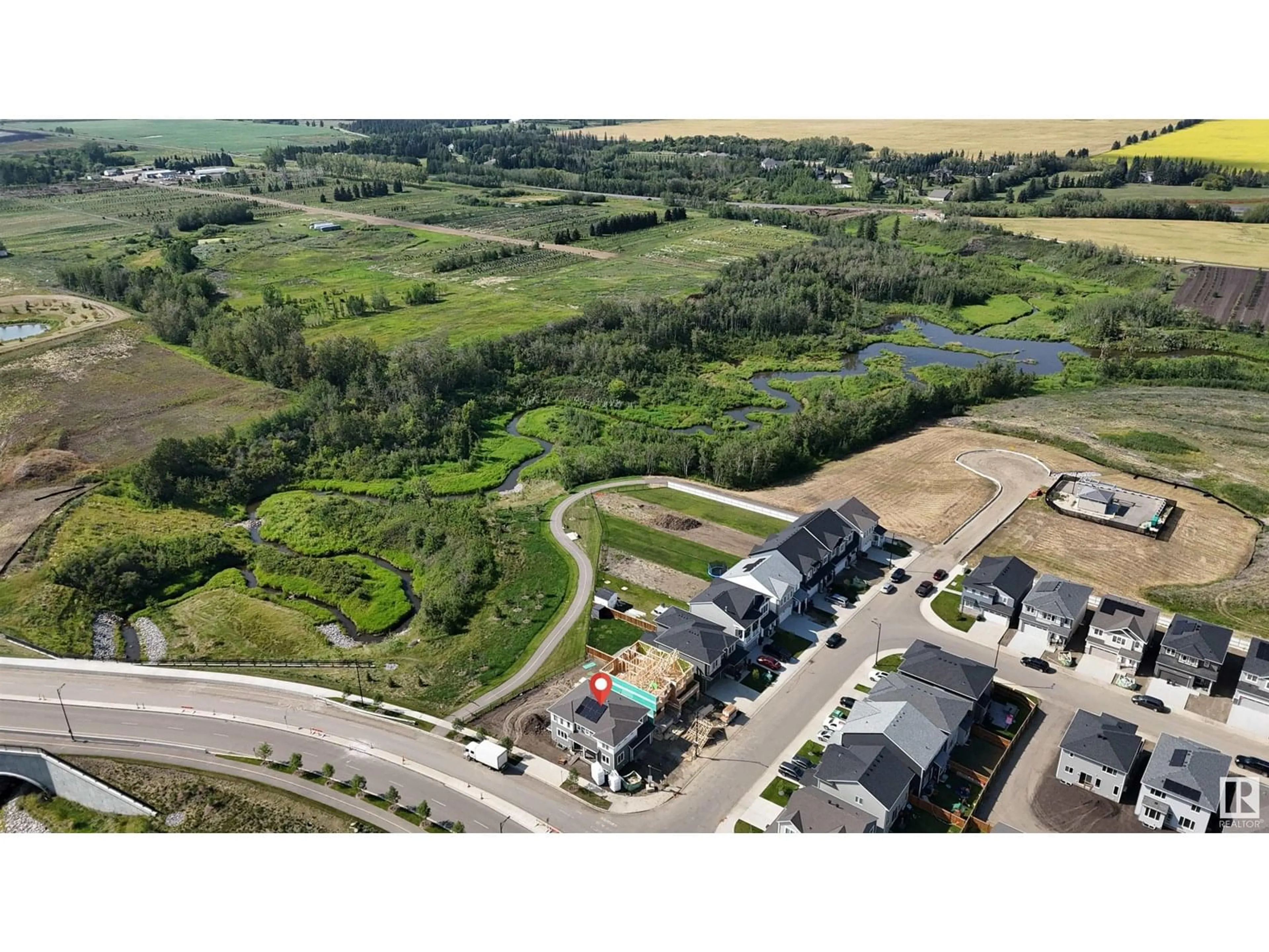 A pic from outside/outdoor area/front of a property/back of a property/a pic from drone, water/lake/river/ocean view for 1133 CRESTVIEW TC, Sherwood Park Alberta T8H3A2