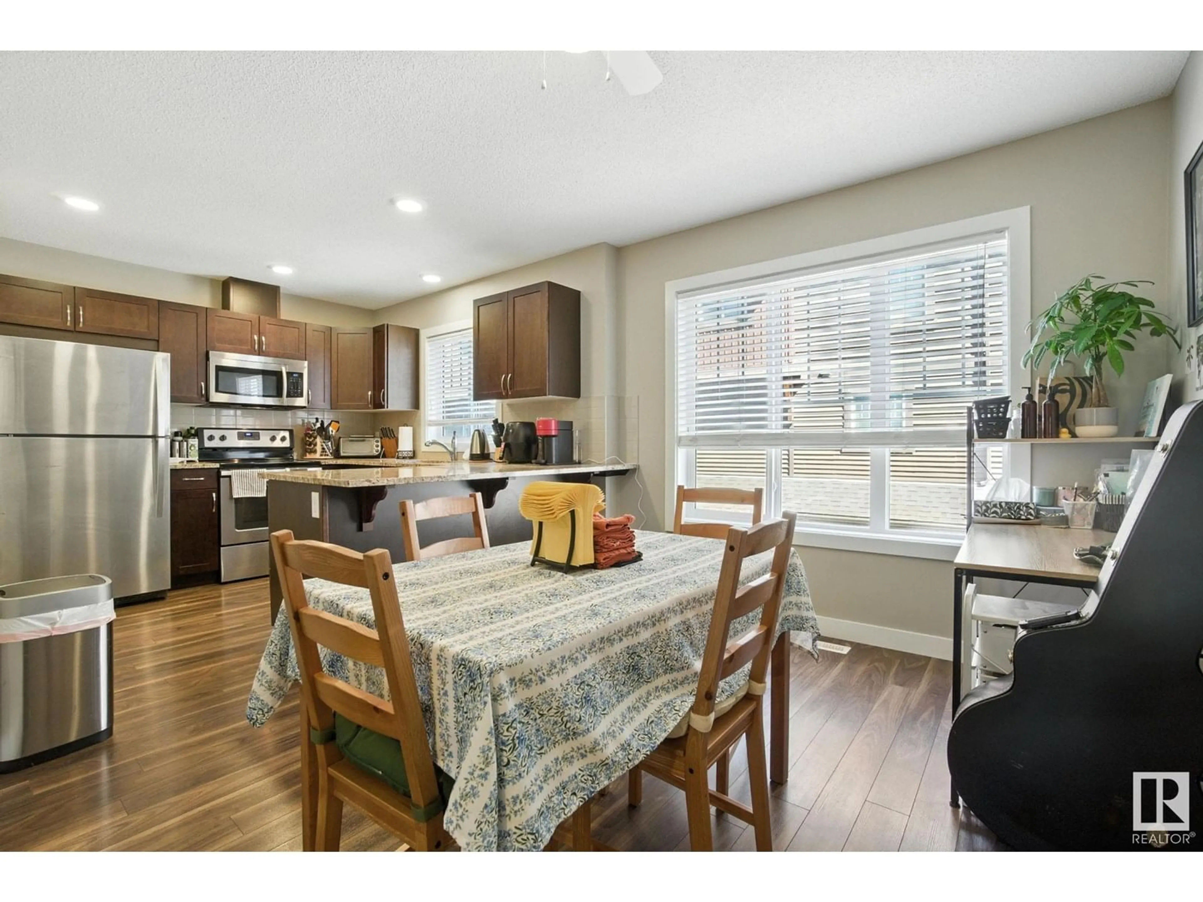 Open concept kitchen, wood/laminate floor for 53 - 1005 GRAYDON HILL BV, Edmonton Alberta T6W3C8