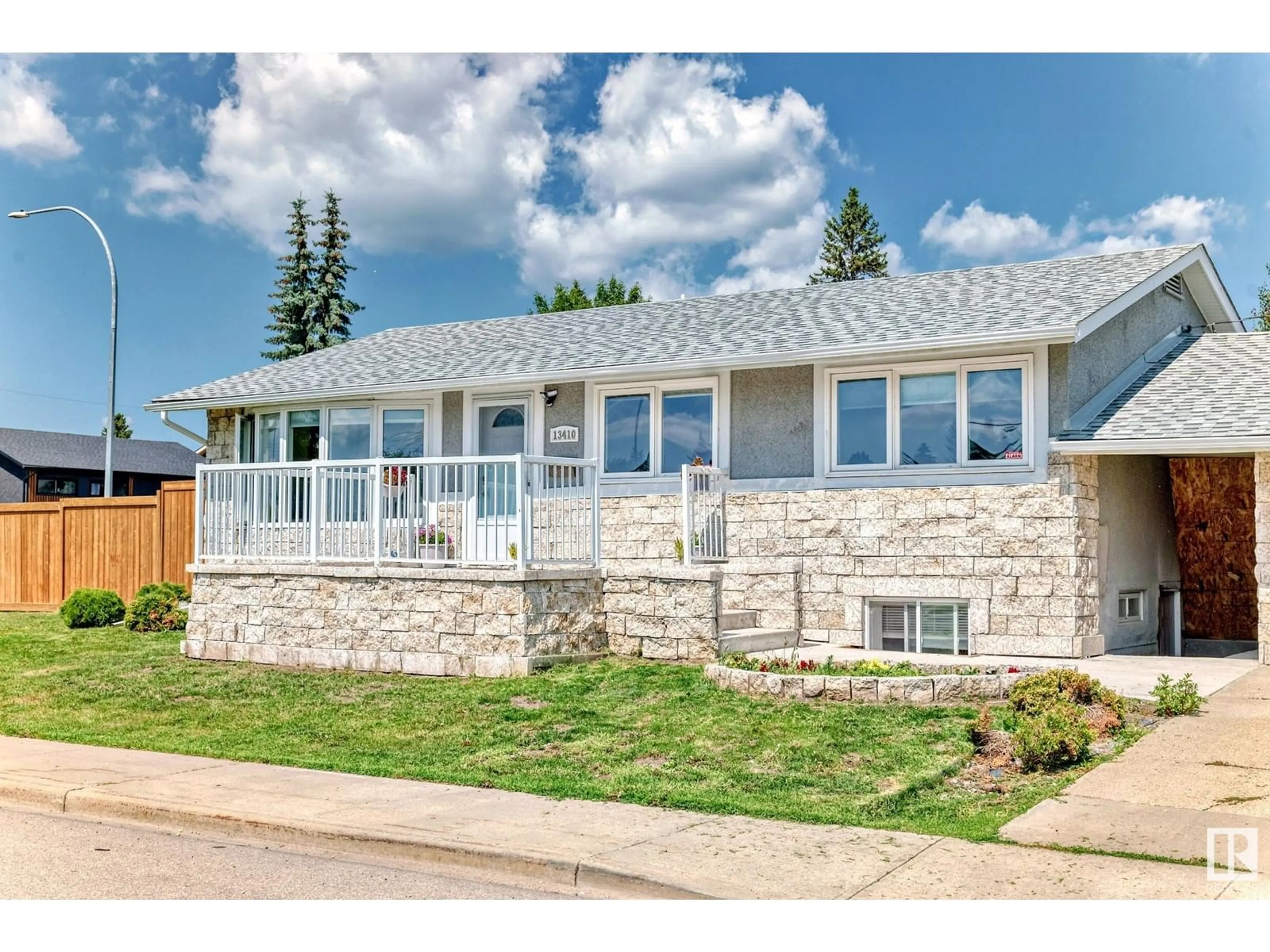 Home with brick exterior material, street for 13410 134 AV, Edmonton Alberta T5L3V9
