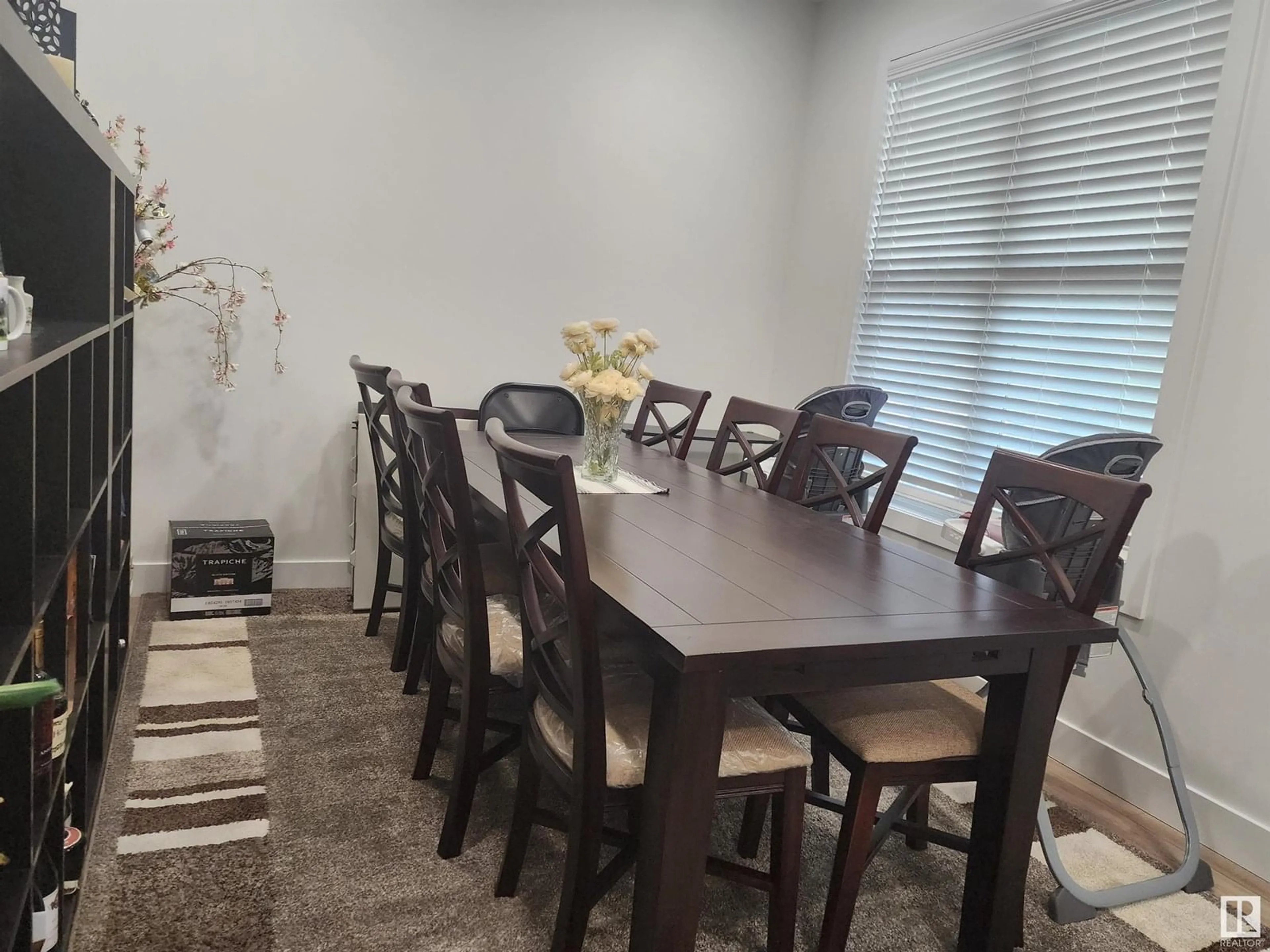 Dining room, wood/laminate floor for 129 GRIESBACH RD, Edmonton Alberta T5E6L9