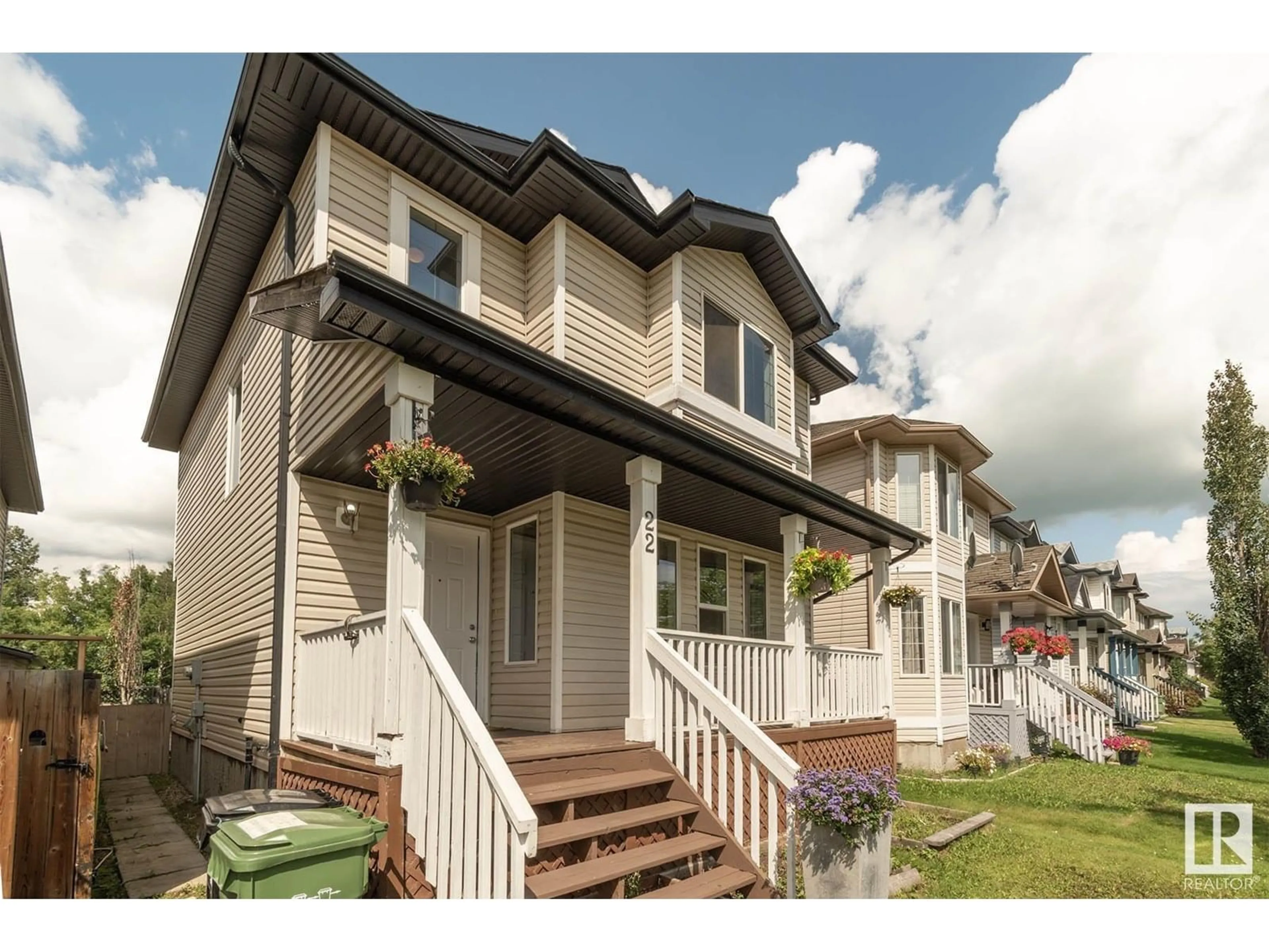 Home with vinyl exterior material, street for 22 DOUGLAS LN, Leduc Alberta T9E8P5