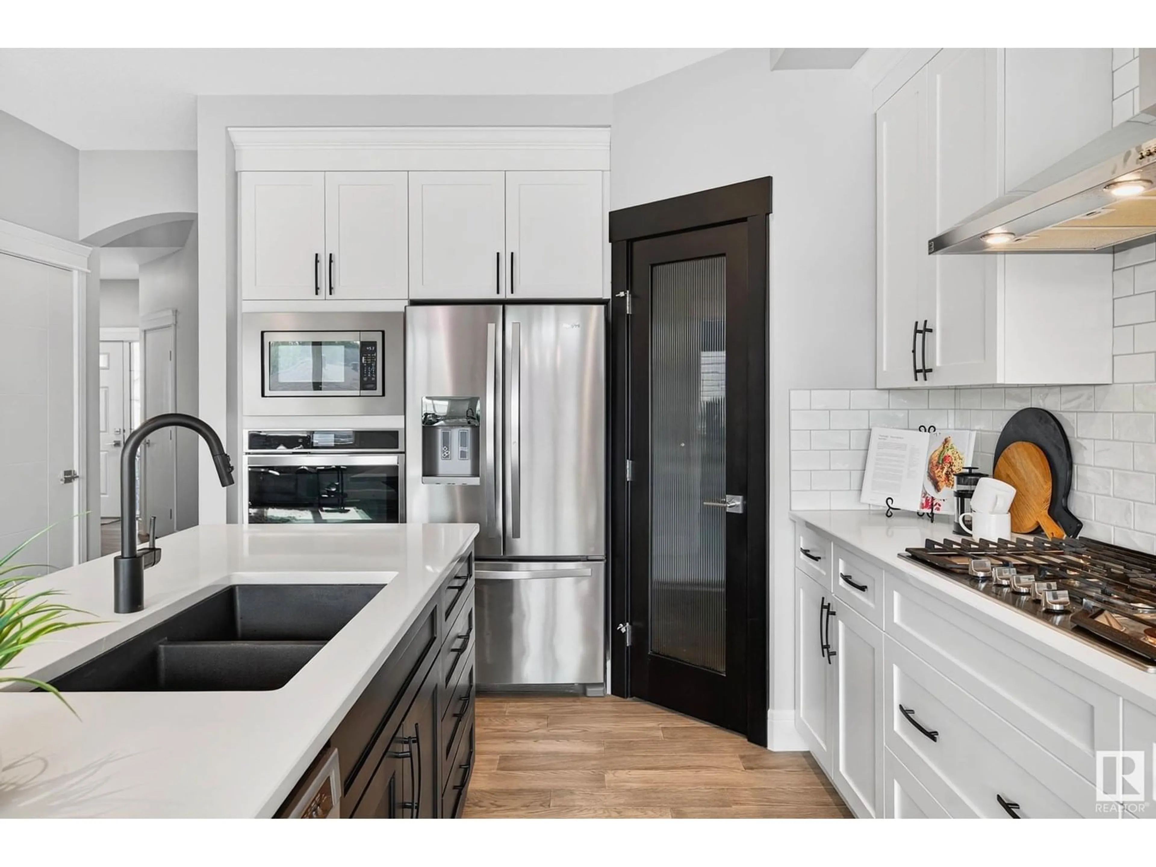 Open concept kitchen, ceramic/tile floor for 237 HAWKS RIDGE BV, Edmonton Alberta T5S0M1
