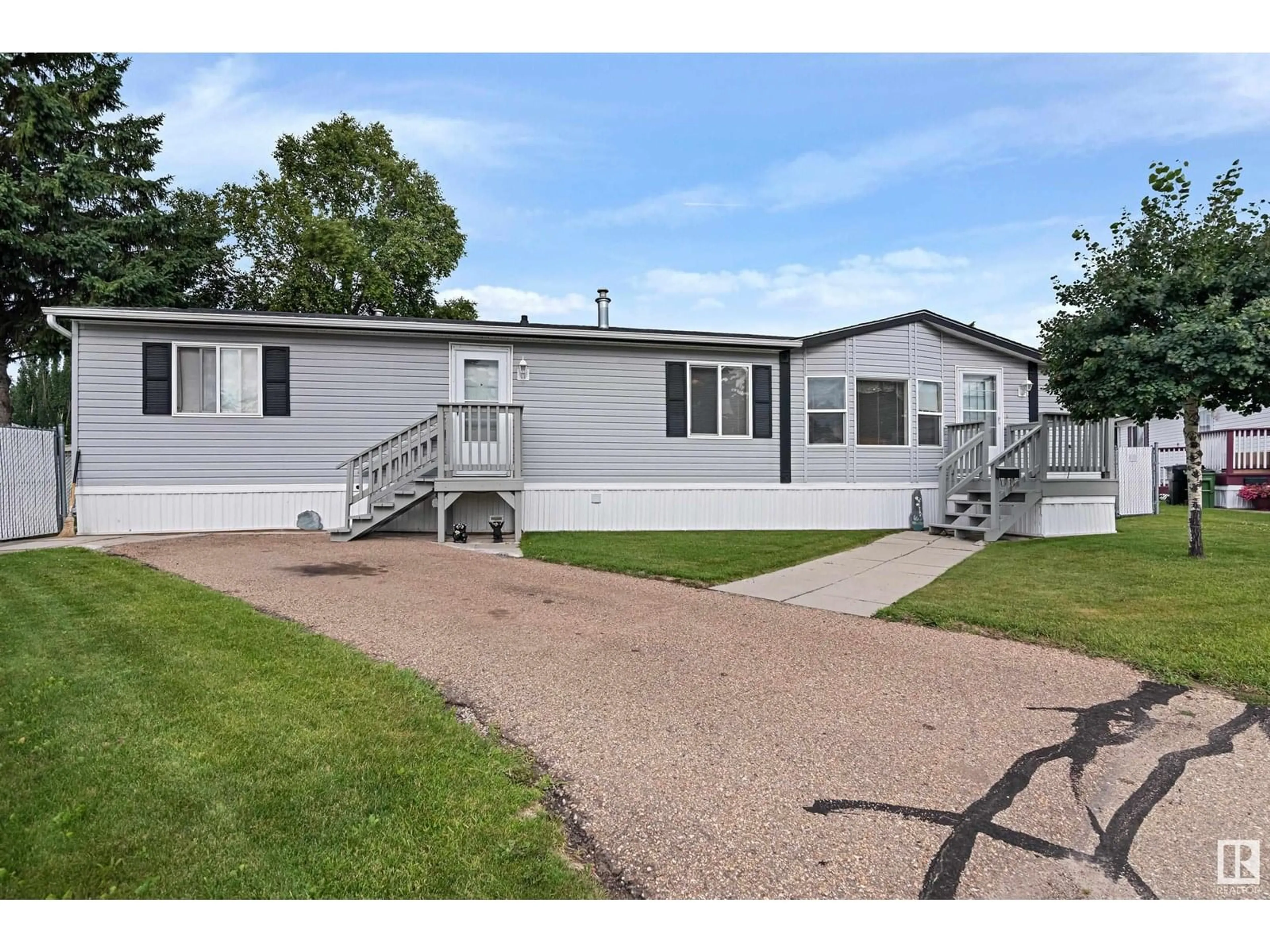 Home with vinyl exterior material, street for 321 EVERGREEN PA, Edmonton Alberta T5Y4M2