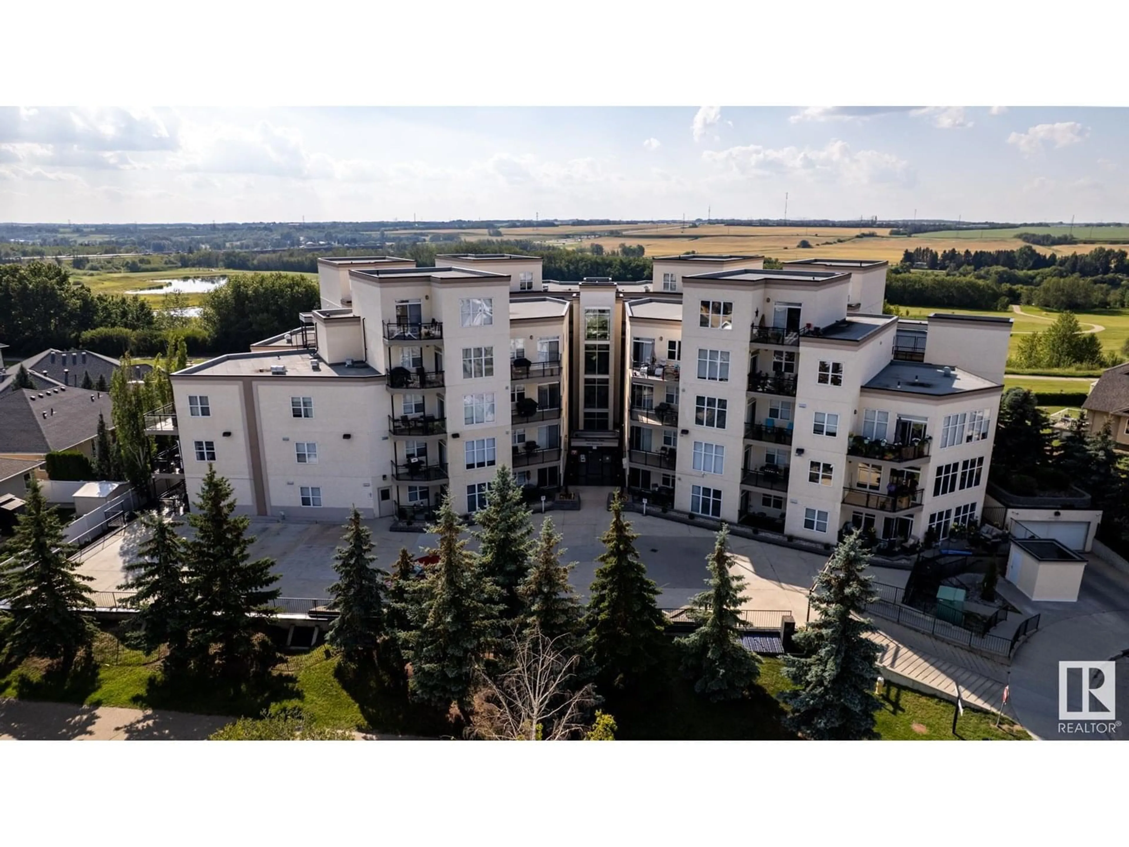 A pic from outside/outdoor area/front of a property/back of a property/a pic from drone, unknown for 300 - 9940 SHERRIDON DR, Fort Saskatchewan Alberta T8L4C9