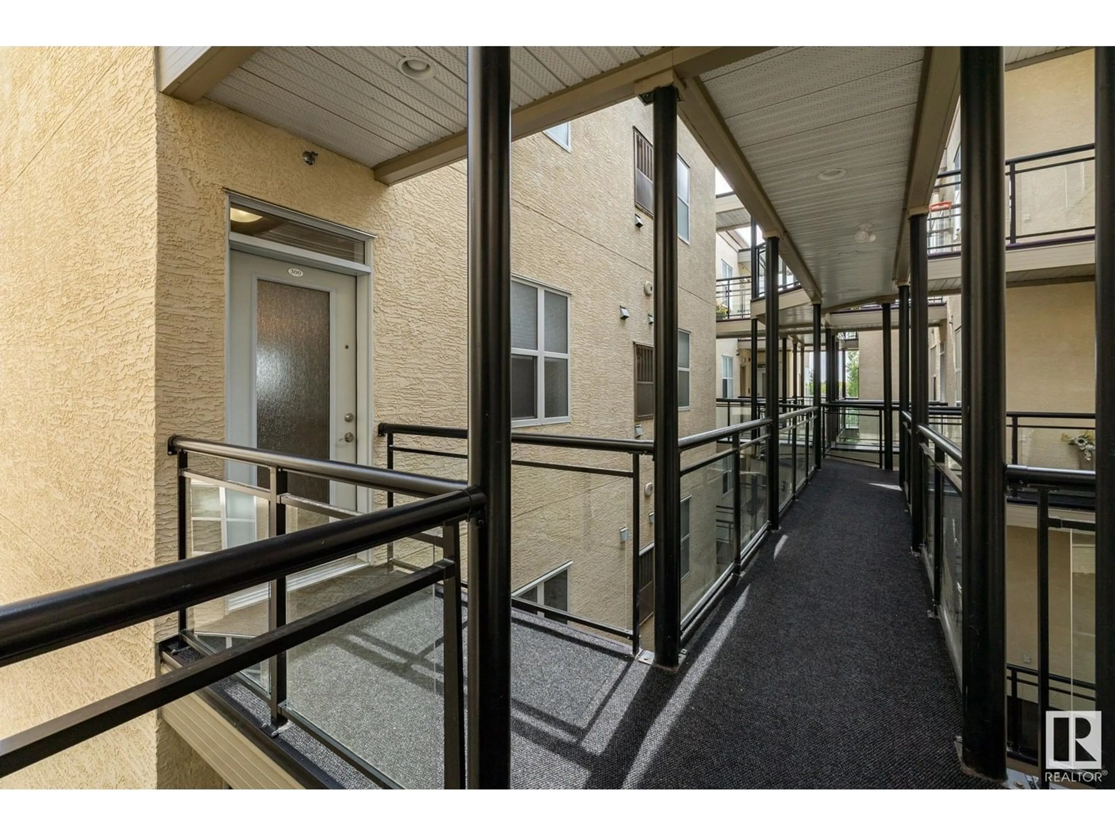 Indoor foyer for 300 - 9940 SHERRIDON DR, Fort Saskatchewan Alberta T8L4C9