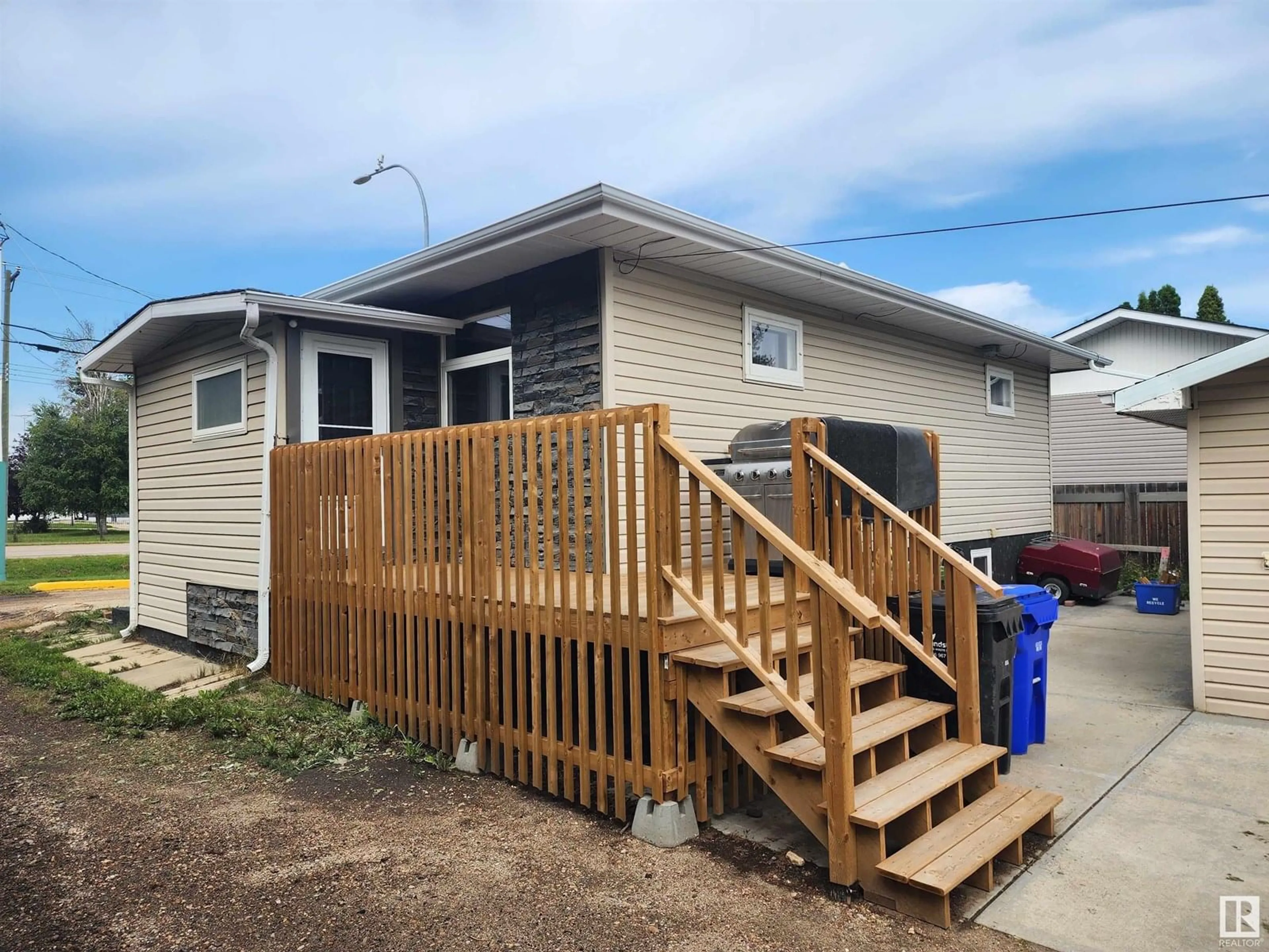 Home with vinyl exterior material, street for 4601 48 ST, Bruderheim Alberta T0B0S0