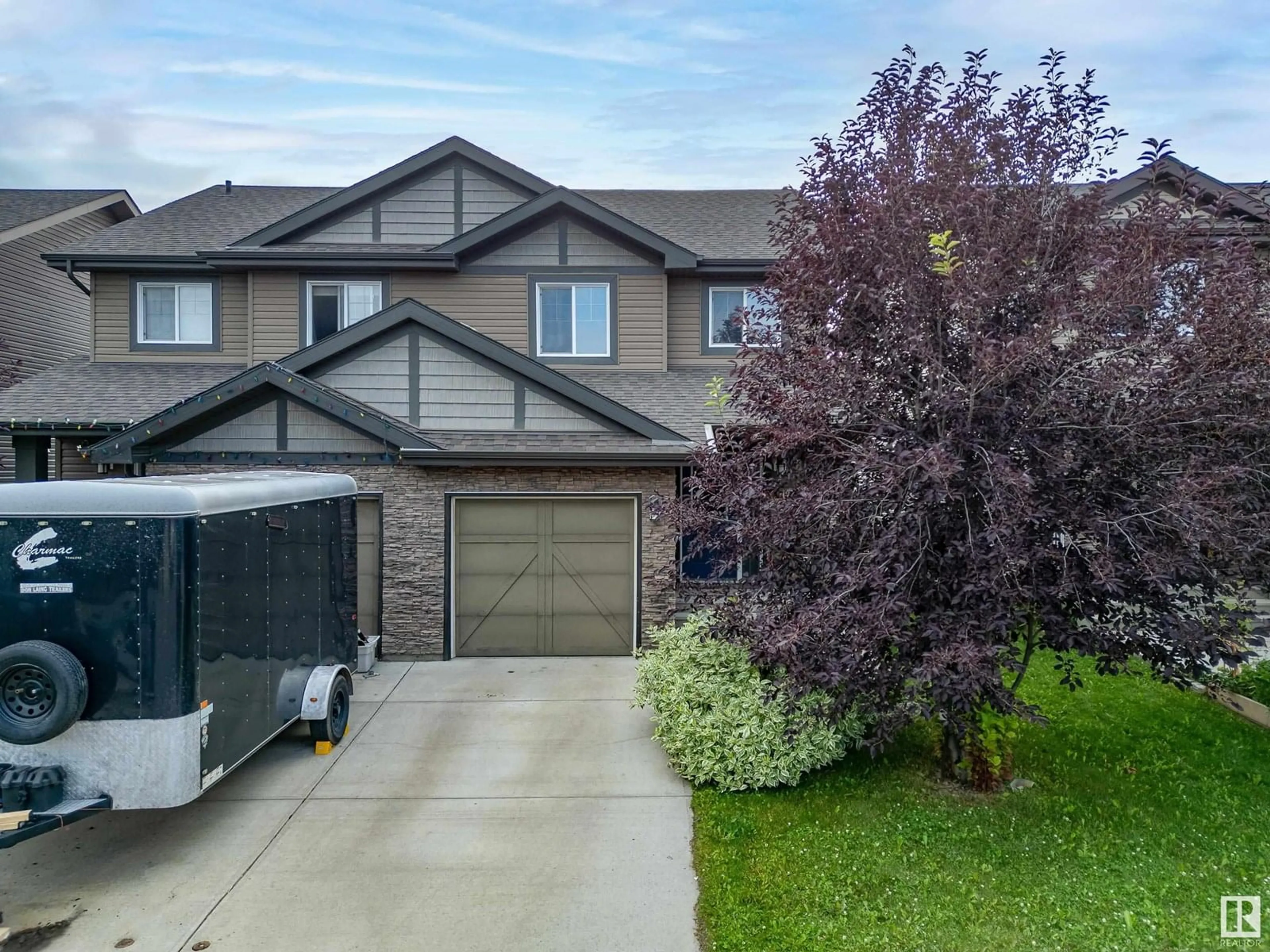 A pic from outside/outdoor area/front of a property/back of a property/a pic from drone, street for 12 PETER ST, Spruce Grove Alberta T7X0R4