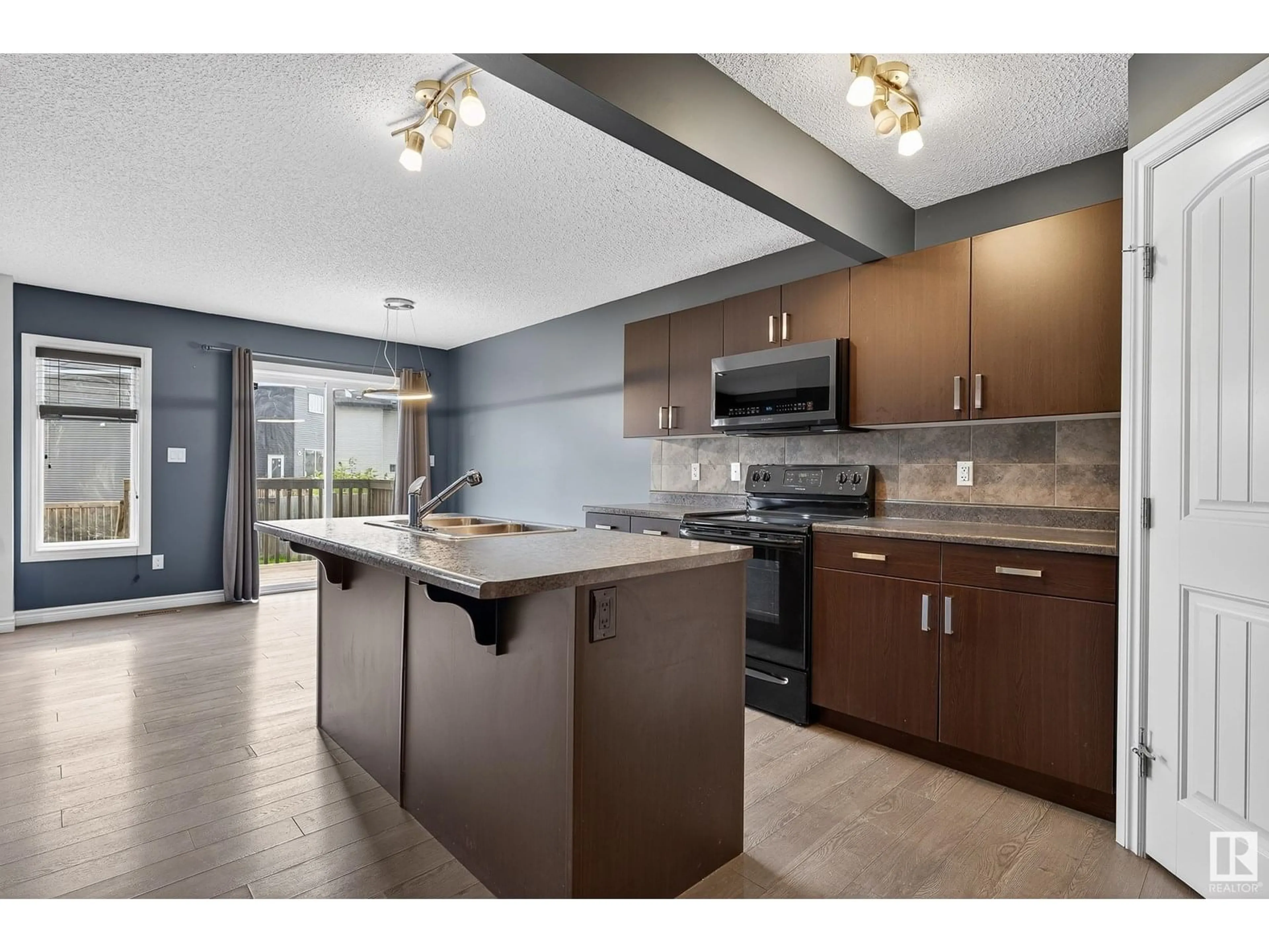 Open concept kitchen, unknown for 12 PETER ST, Spruce Grove Alberta T7X0R4