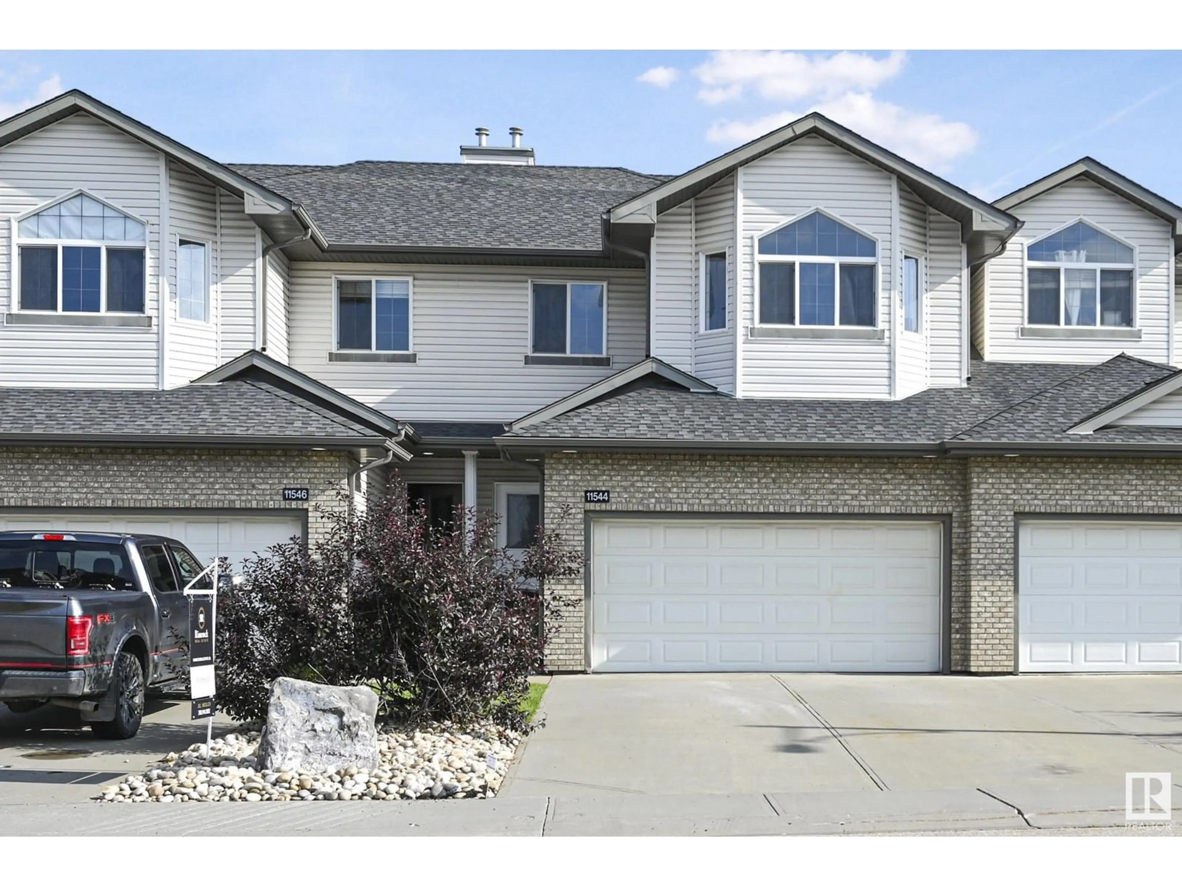 Home with vinyl exterior material, street for 11544 11 AV, Edmonton Alberta T6W1W8