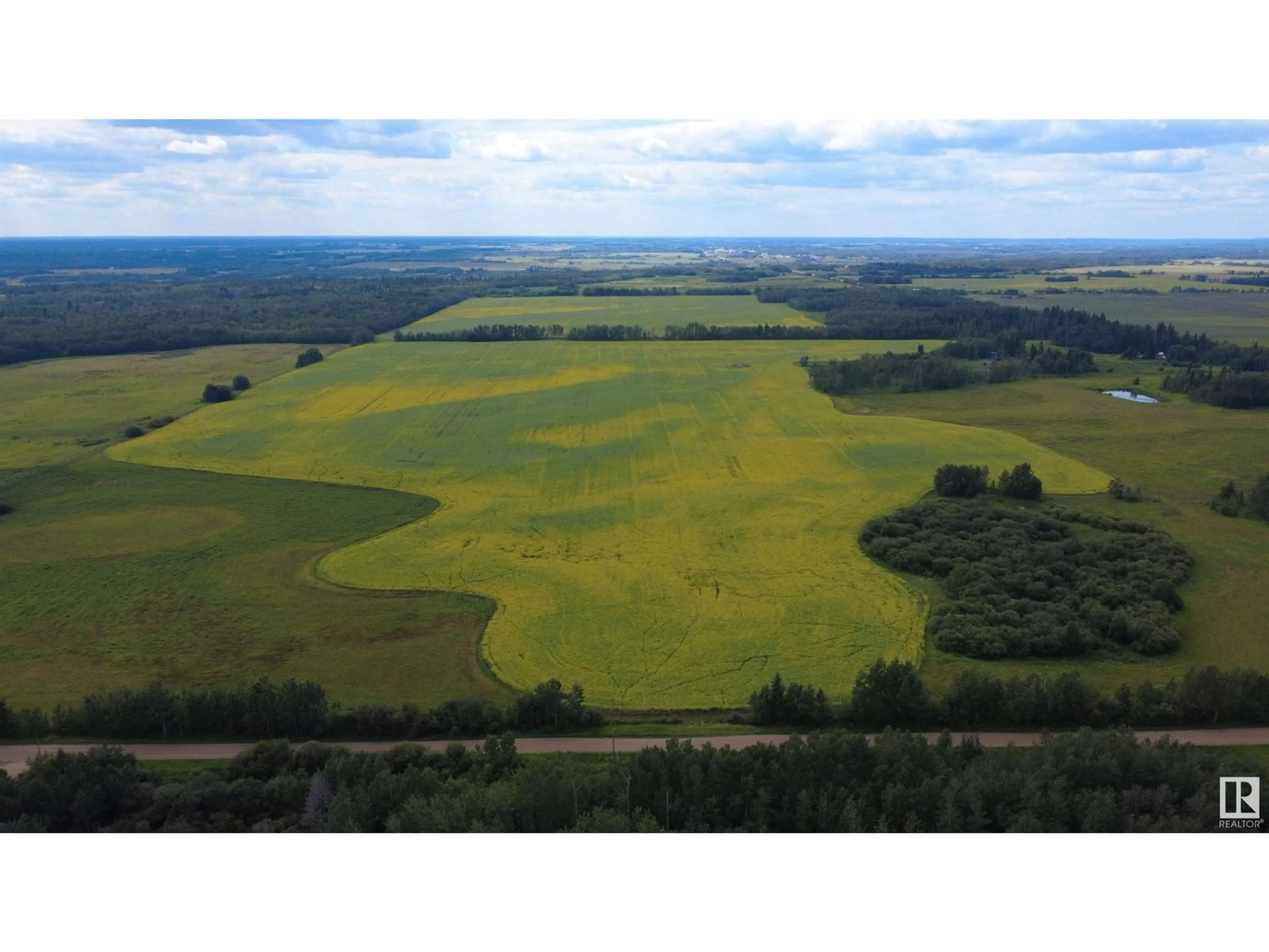 A pic from outside/outdoor area/front of a property/back of a property/a pic from drone, water/lake/river/ocean view for 21113 TWP ROAD 574, Rural Sturgeon County Alberta T0A2W0