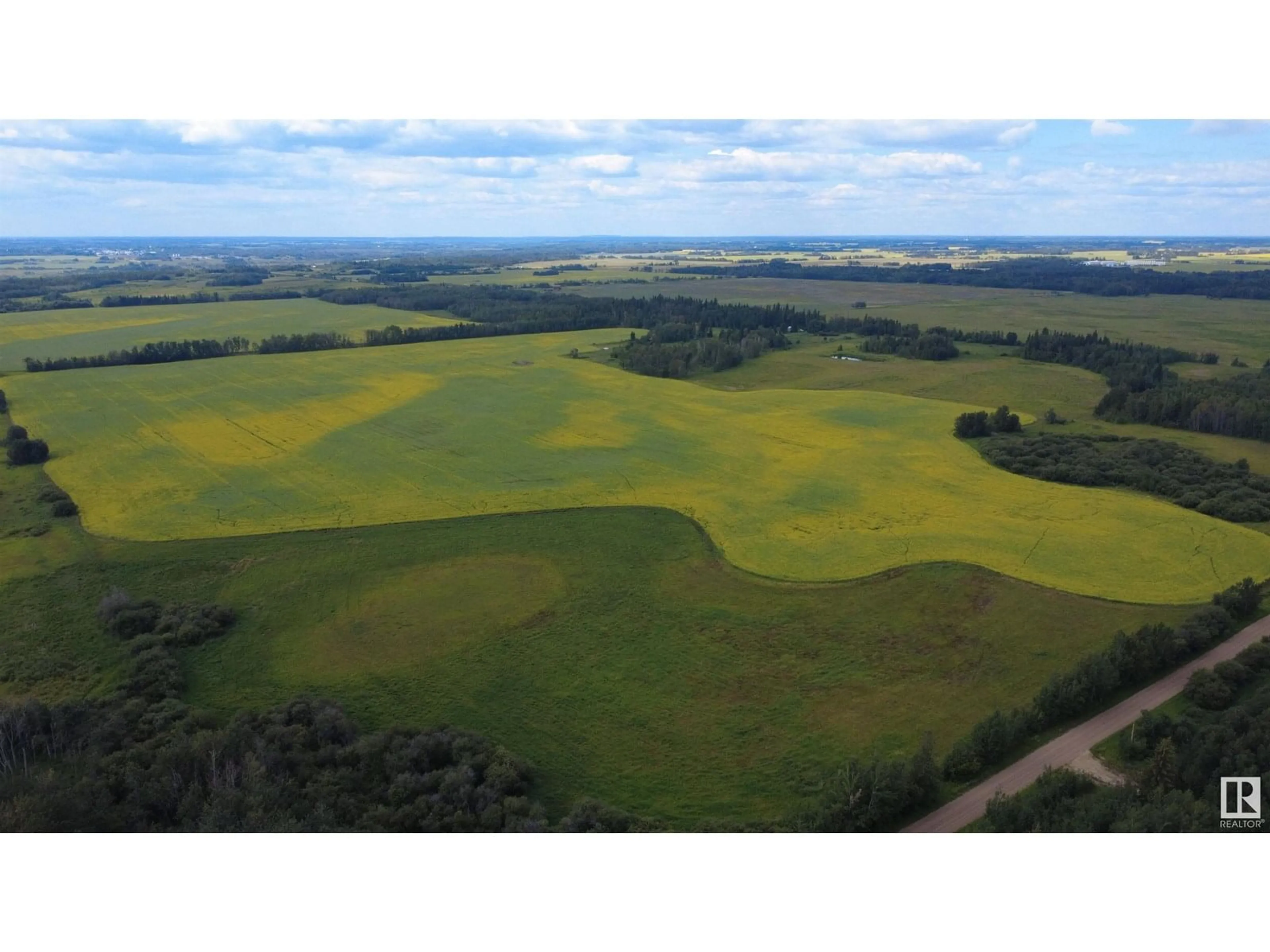 A pic from outside/outdoor area/front of a property/back of a property/a pic from drone, unknown for 21113 TWP ROAD 574, Rural Sturgeon County Alberta T0A2W0