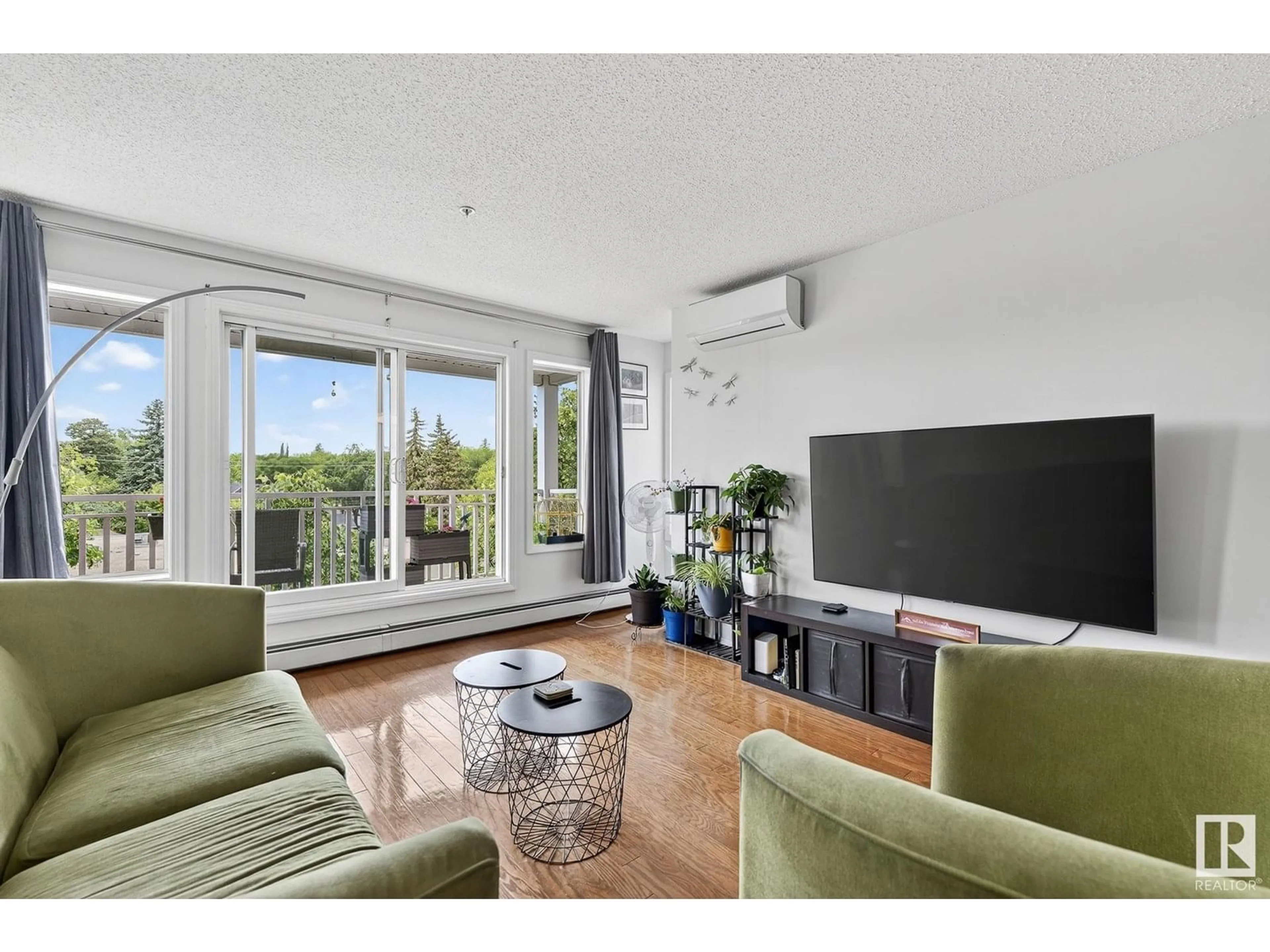Living room with furniture, unknown for 410 - 10951 124 ST NW, Edmonton Alberta T5M4E1