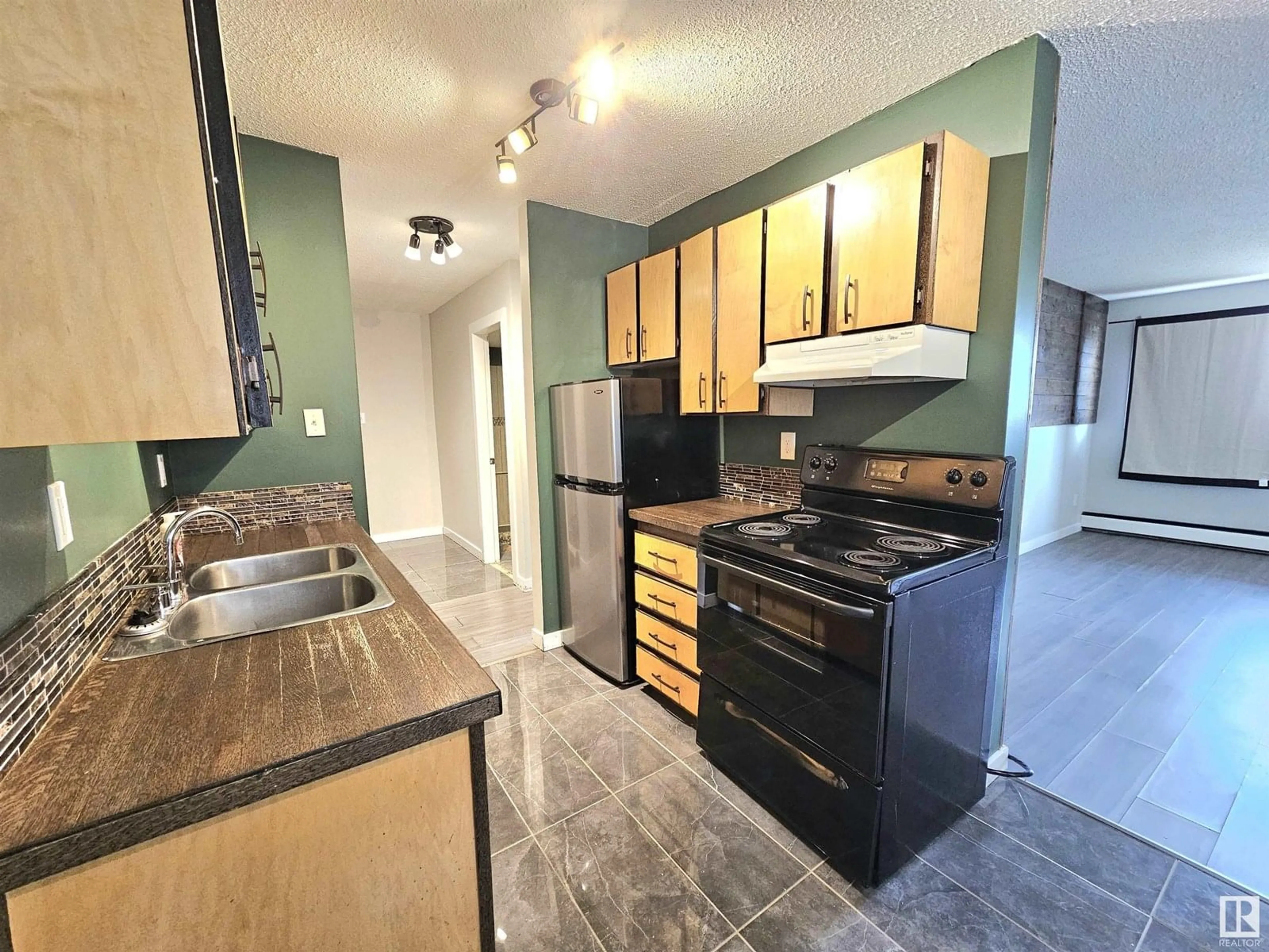 Standard kitchen, ceramic/tile floor for #101 - 12929 127 ST, Edmonton Alberta T5L1B1