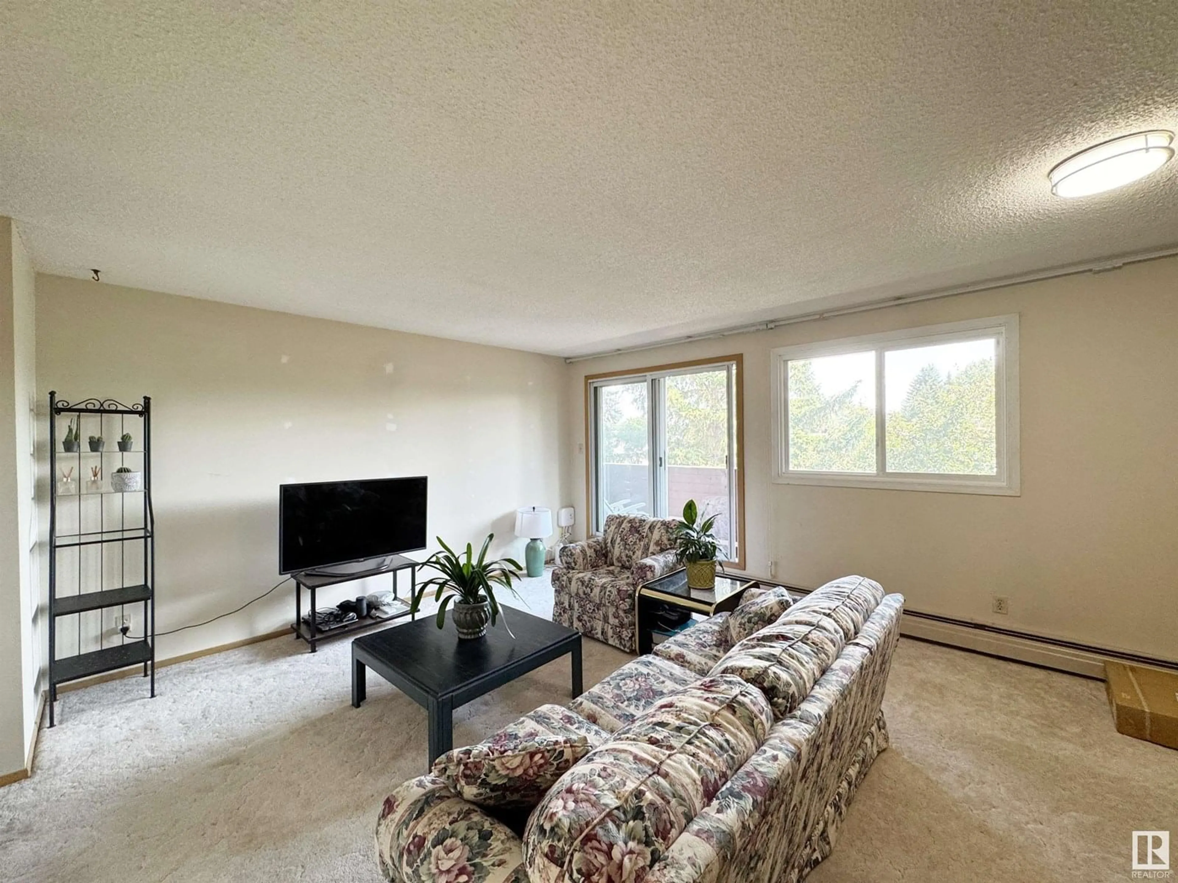 Living room with furniture, unknown for 312 - 2315 119 ST, Edmonton Alberta T6J4E2