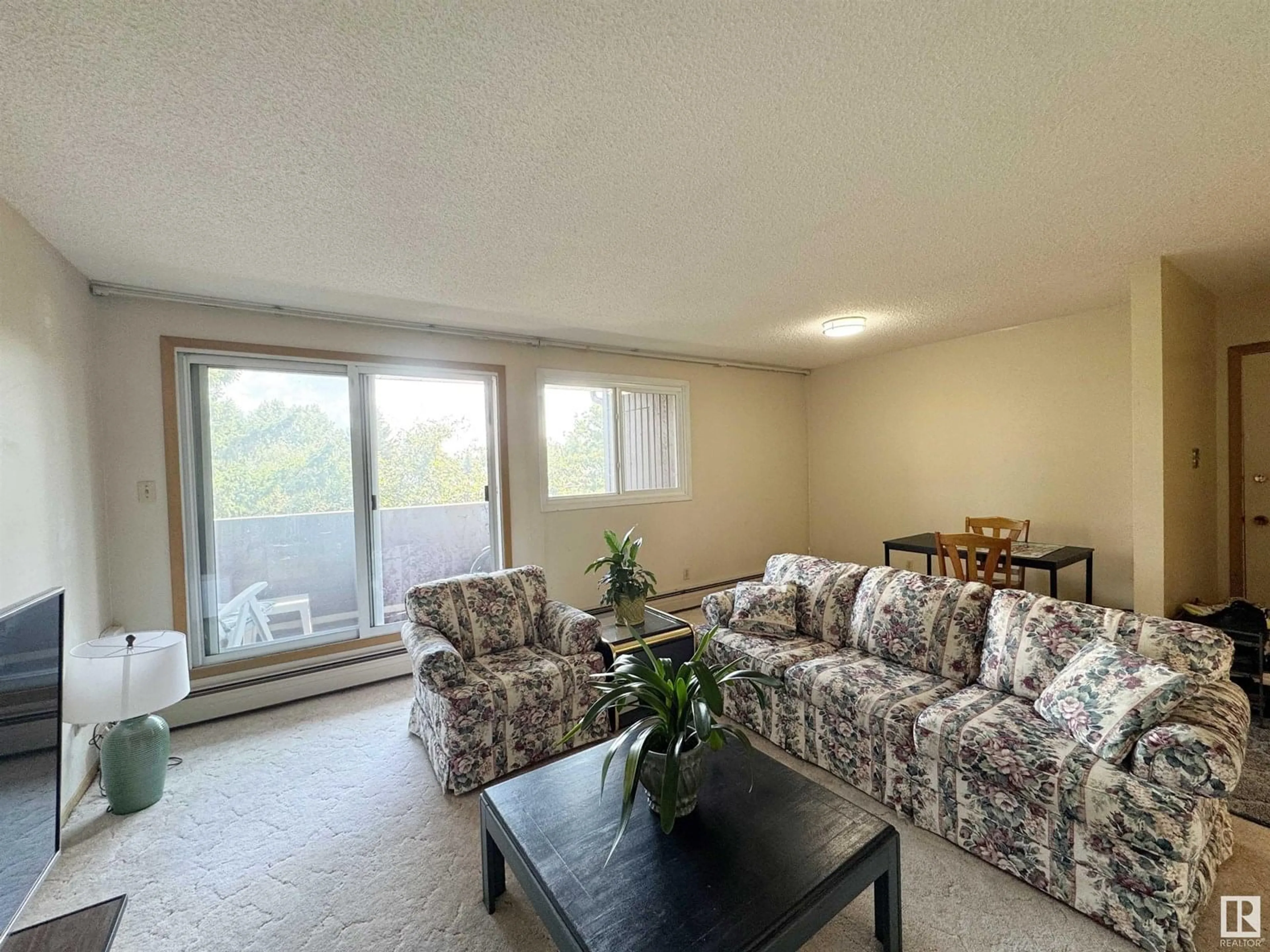 Living room with furniture, unknown for 312 - 2315 119 ST, Edmonton Alberta T6J4E2