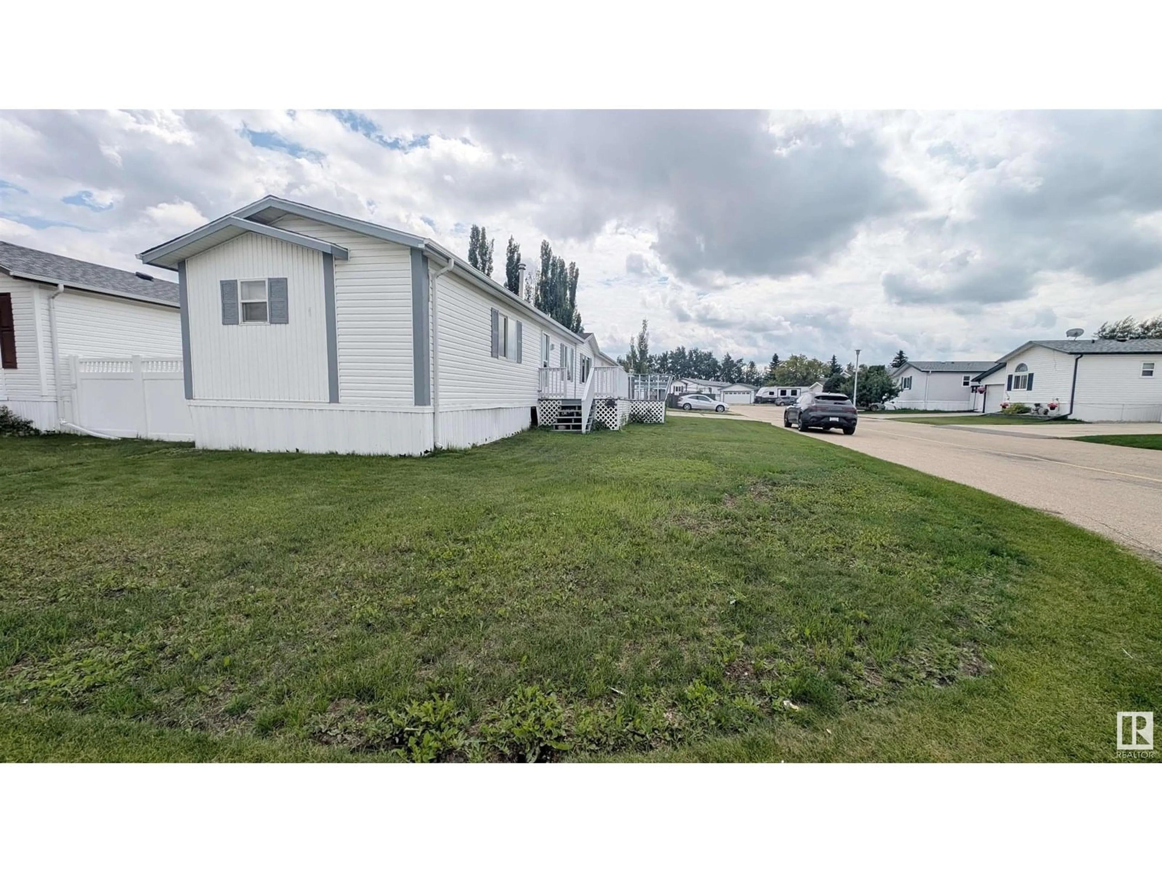 A pic from outside/outdoor area/front of a property/back of a property/a pic from drone, unknown for NW NW - 3136 LAKEWOOD CR, Edmonton Alberta T5S2C5