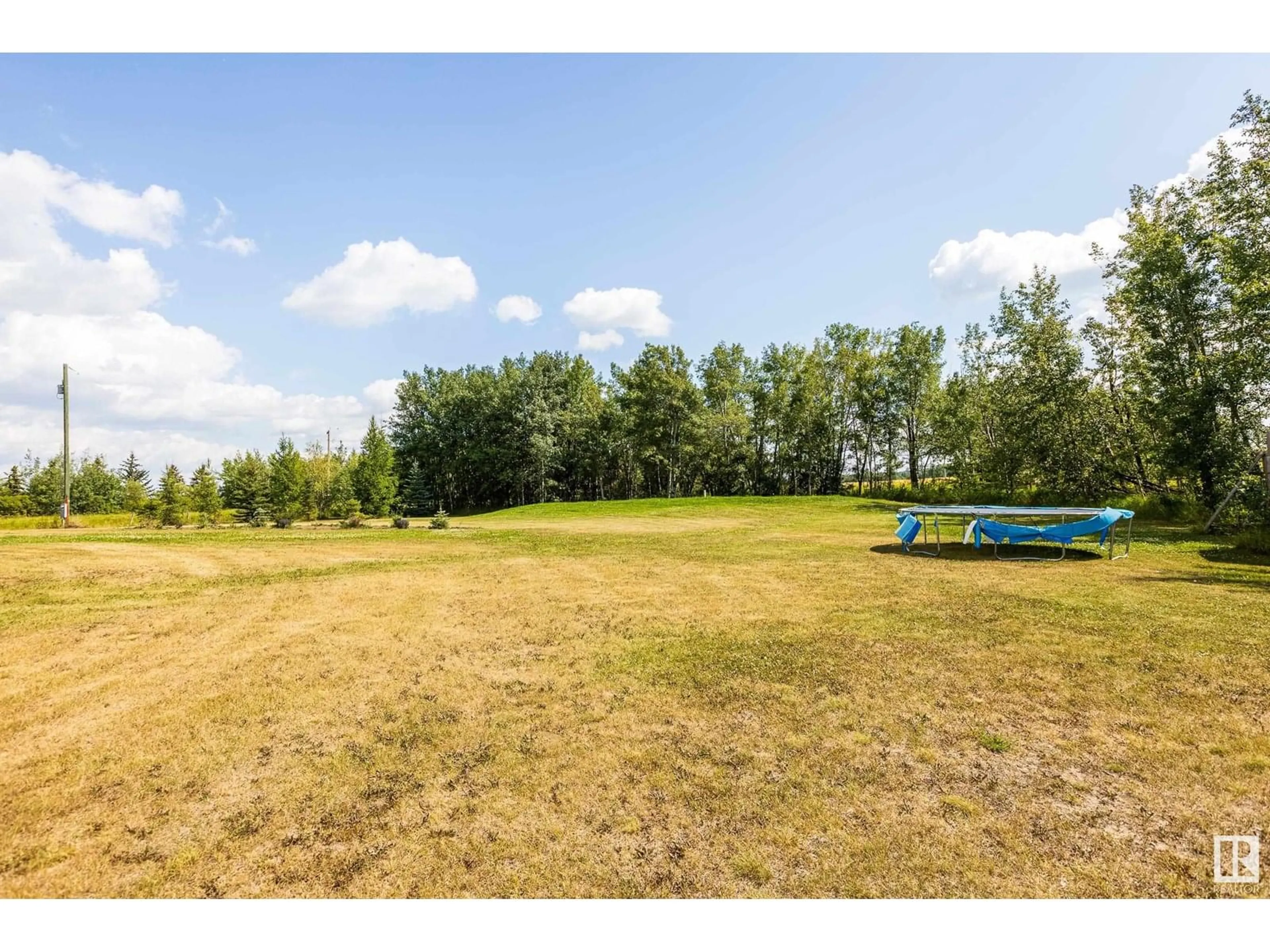 A pic from outside/outdoor area/front of a property/back of a property/a pic from drone, forest/trees view for 59318 RG RD 10, Rural Westlock County Alberta T7P2P6
