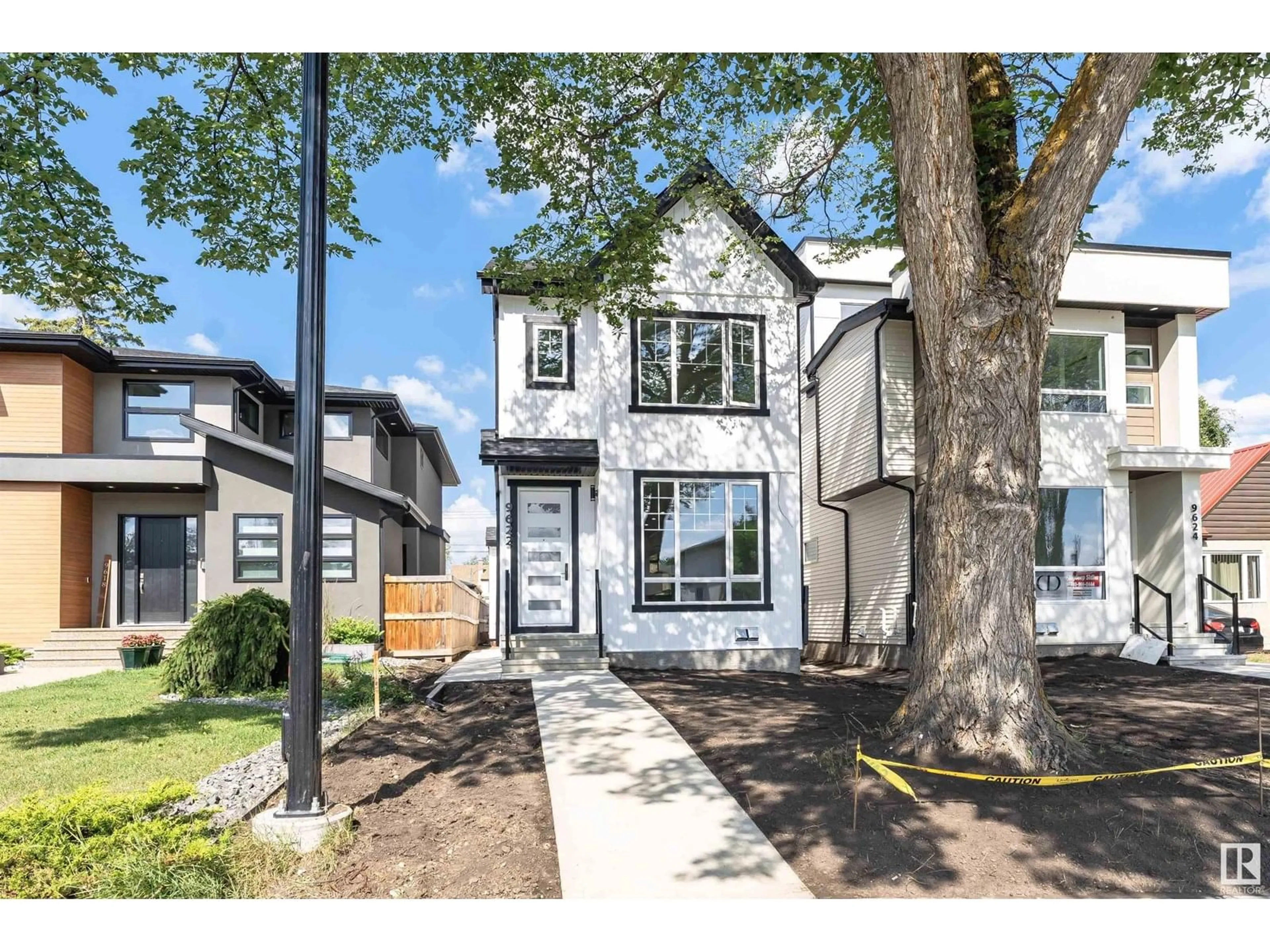 Home with vinyl exterior material, street for 9622 86 ST, Edmonton Alberta T6C3E9