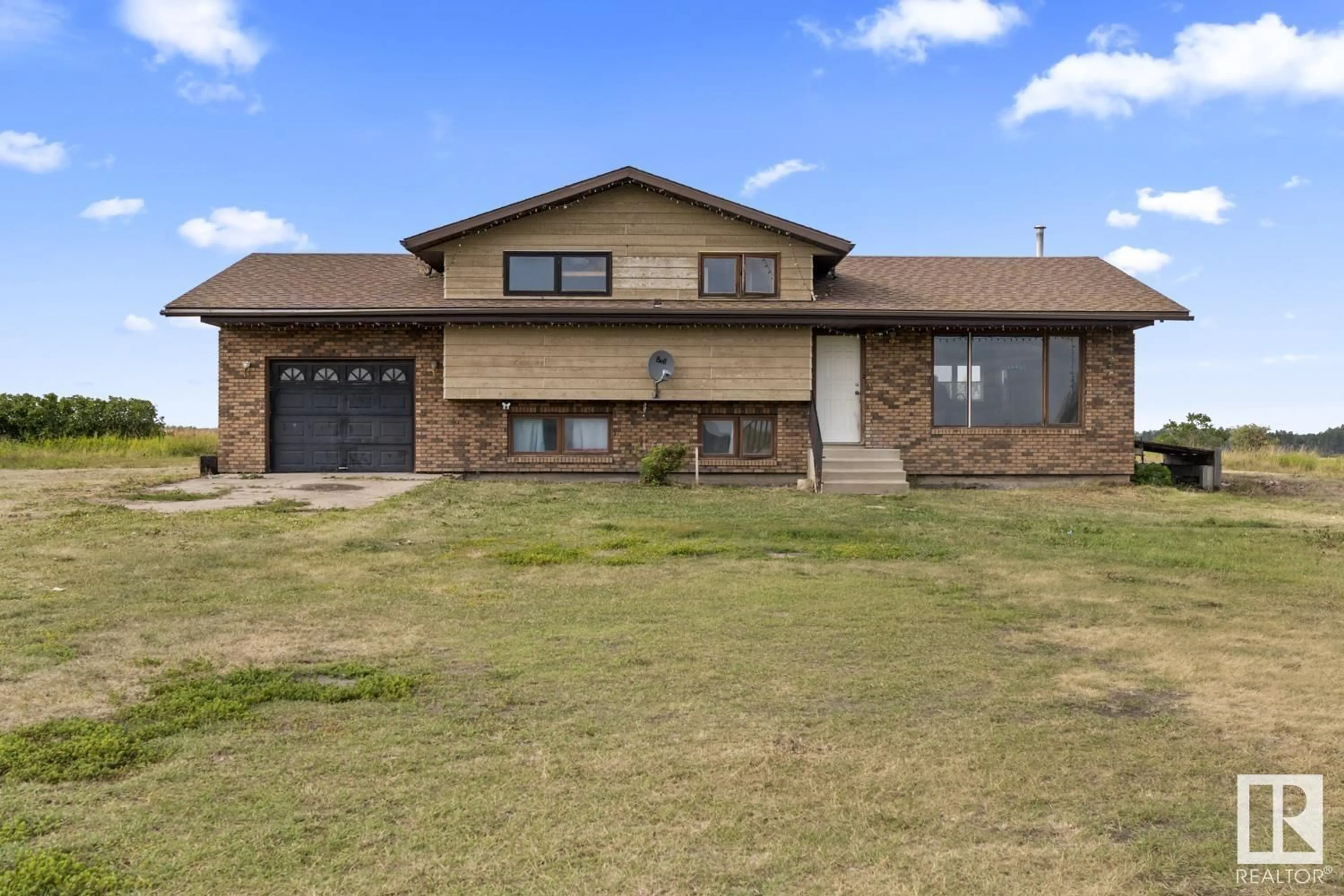 Home with brick exterior material, street for 42128 TWP RD 620, Rural Bonnyville M.D. Alberta T9M1P4