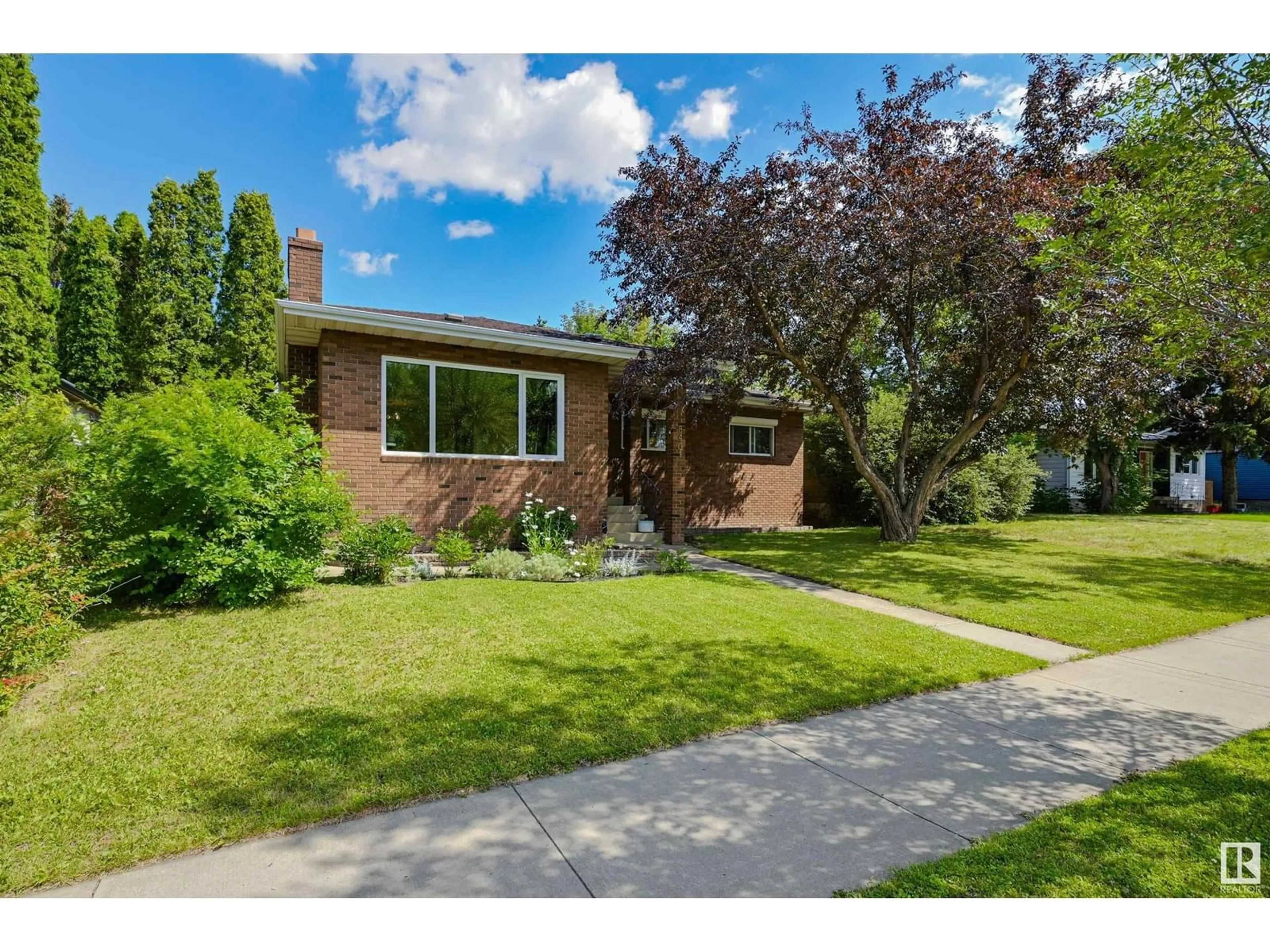 Home with brick exterior material, street for 8401 79 ST, Edmonton Alberta T6C2P1