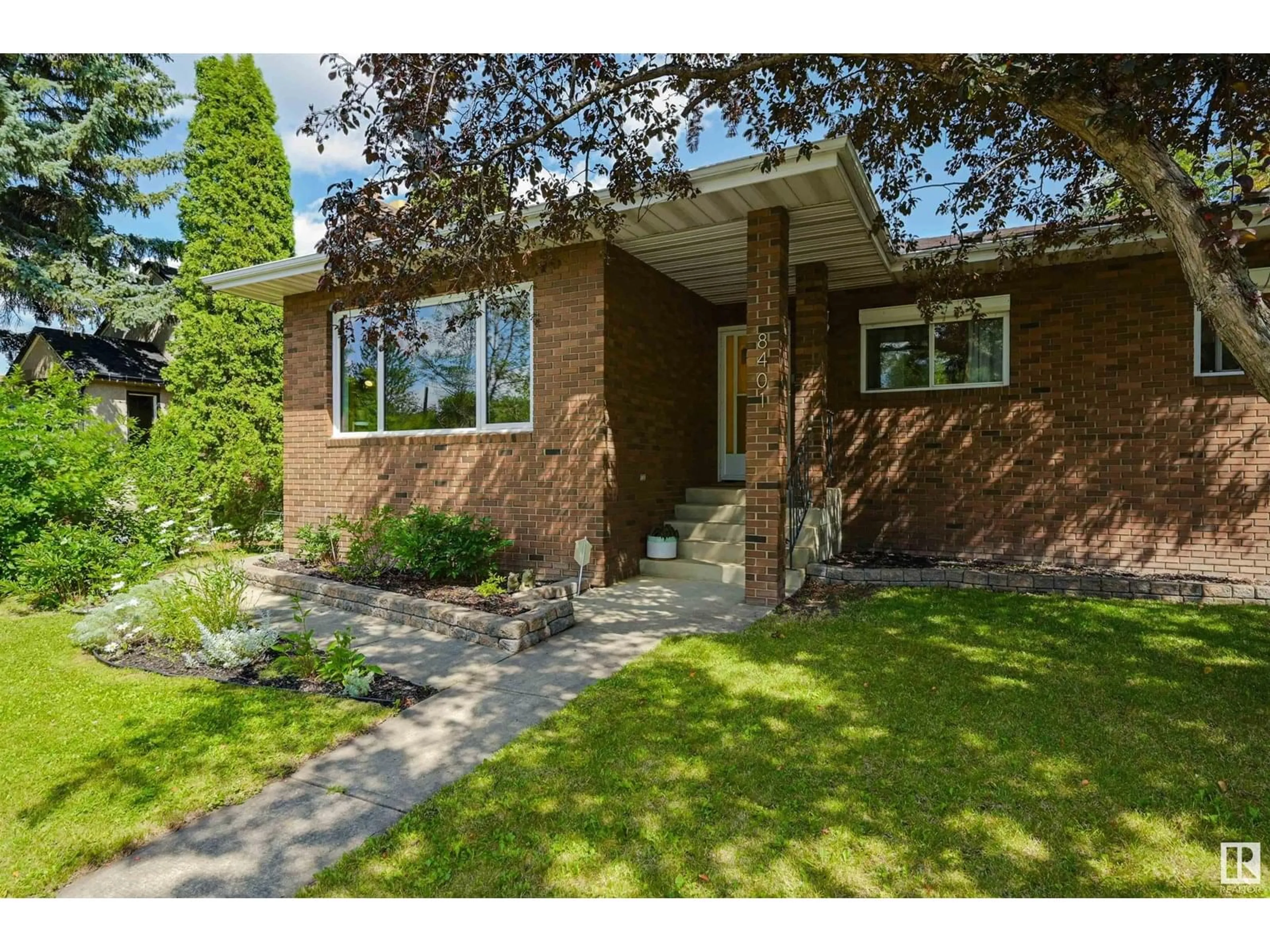 Home with brick exterior material, street for 8401 79 ST, Edmonton Alberta T6C2P1