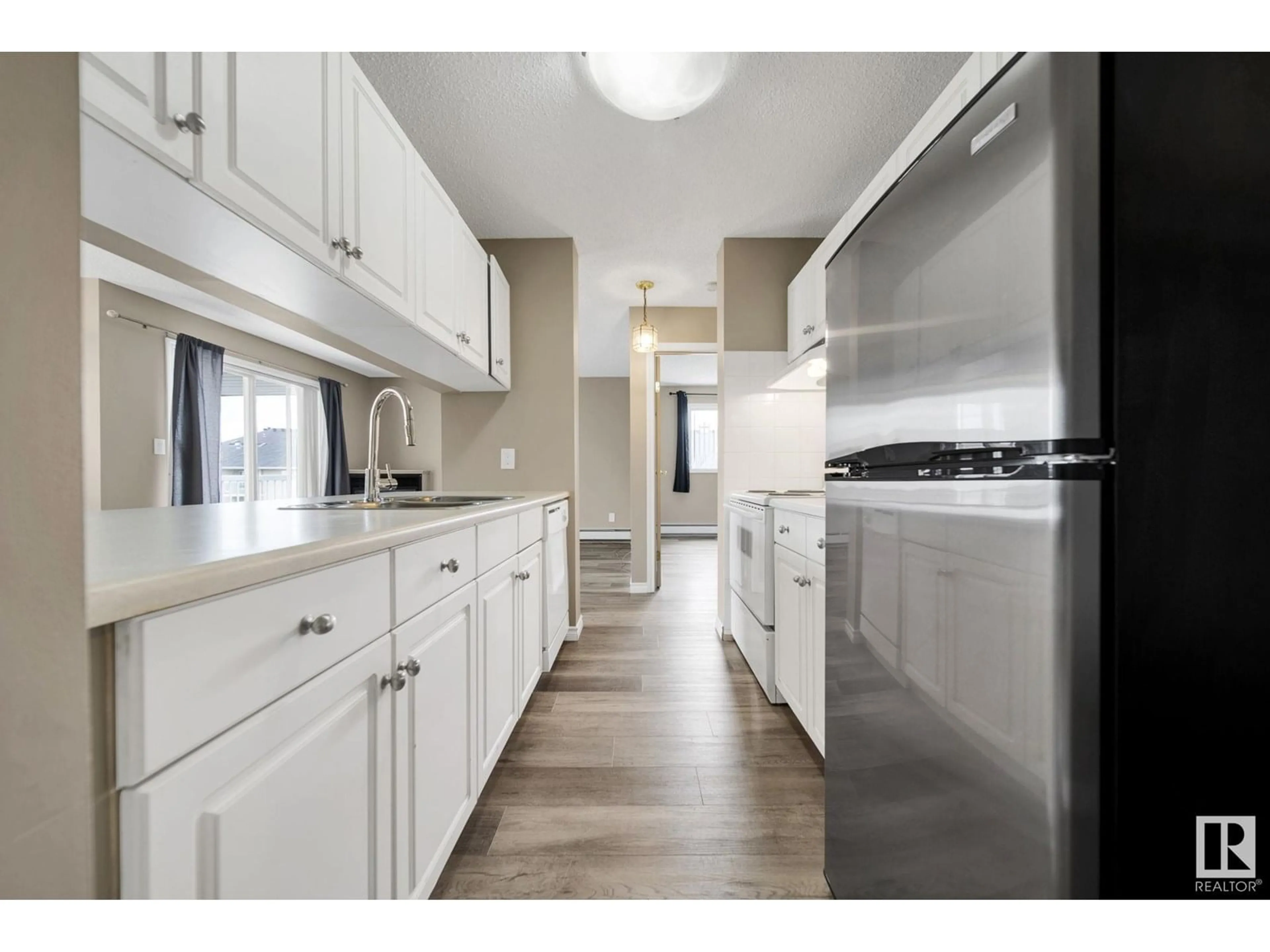 Open concept kitchen, unknown for 401 - 4220 139 AVE NW, Edmonton Alberta T5Y2Y2