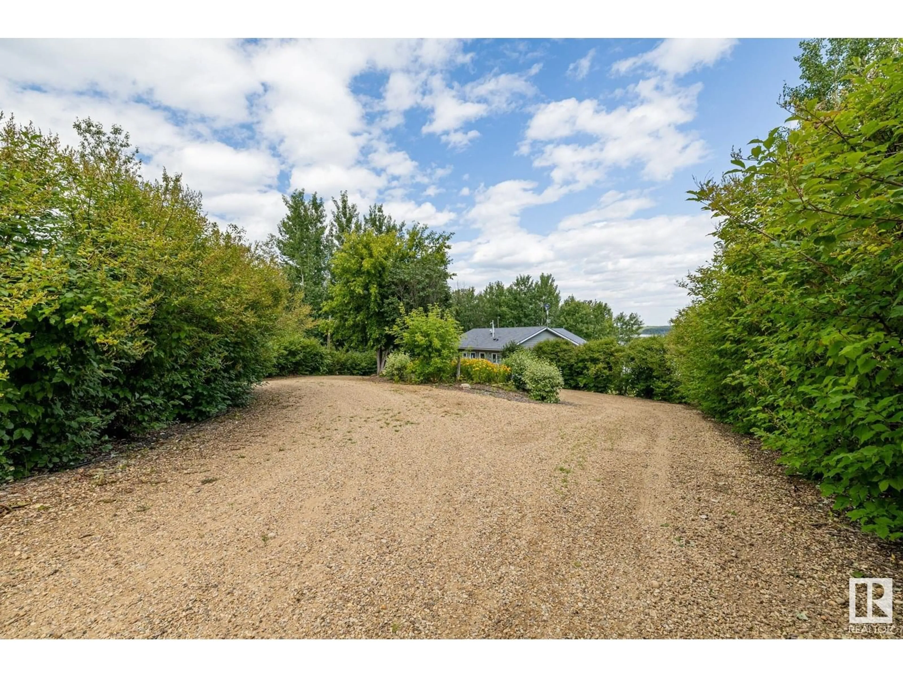 A pic from outside/outdoor area/front of a property/back of a property/a pic from drone, unknown for 75 NEILSON DR, Rural Athabasca County Alberta T9S1S1