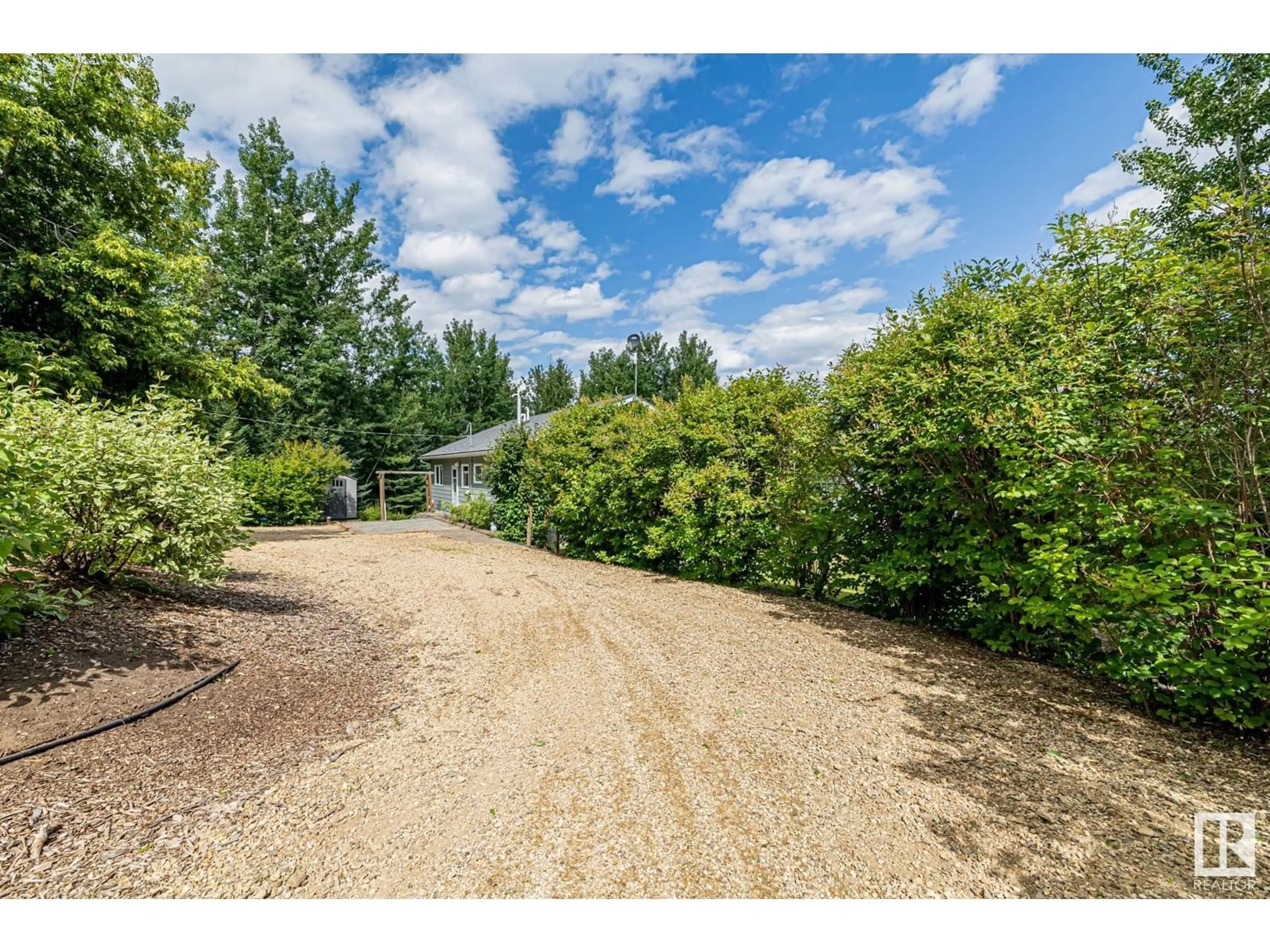 A pic from outside/outdoor area/front of a property/back of a property/a pic from drone, unknown for 75 NEILSON DR, Rural Athabasca County Alberta T9S1S1