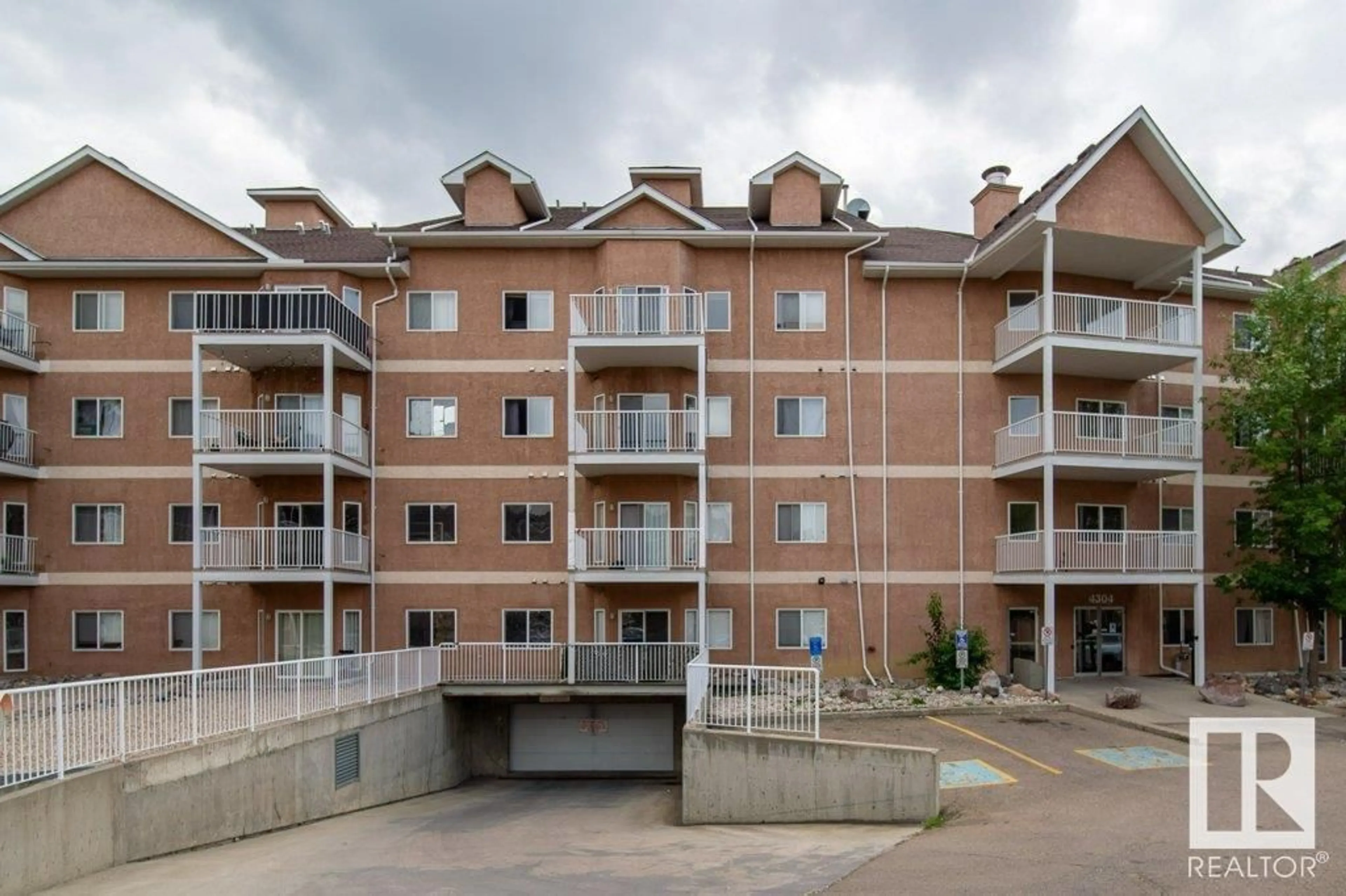 A pic from outside/outdoor area/front of a property/back of a property/a pic from drone, unknown for #303 - 4304 139 AV, Edmonton Alberta T5Y0H6