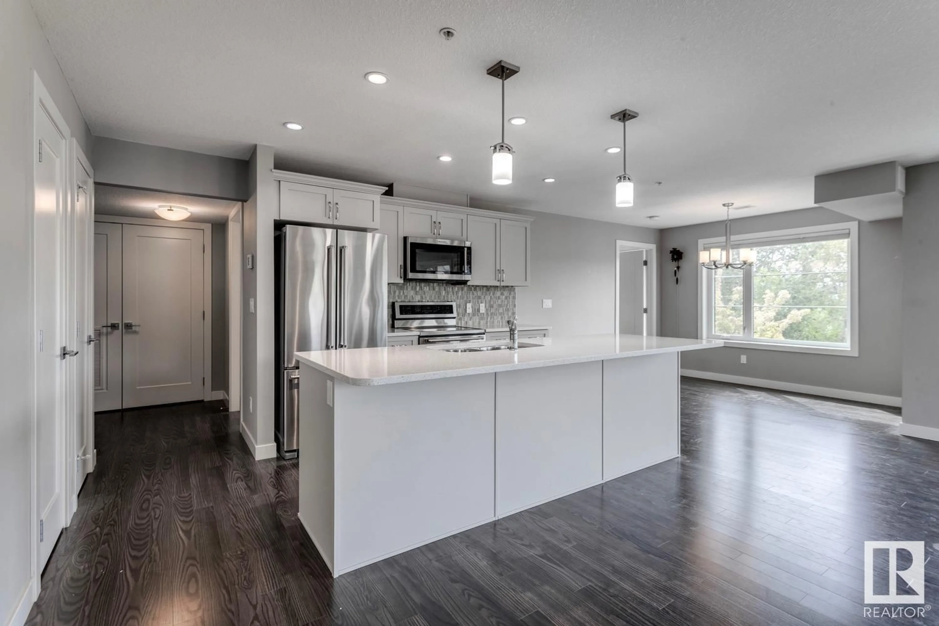 Open concept kitchen, unknown for 206 - 5029 EDGEMONT BV, Edmonton Alberta T6M0S8