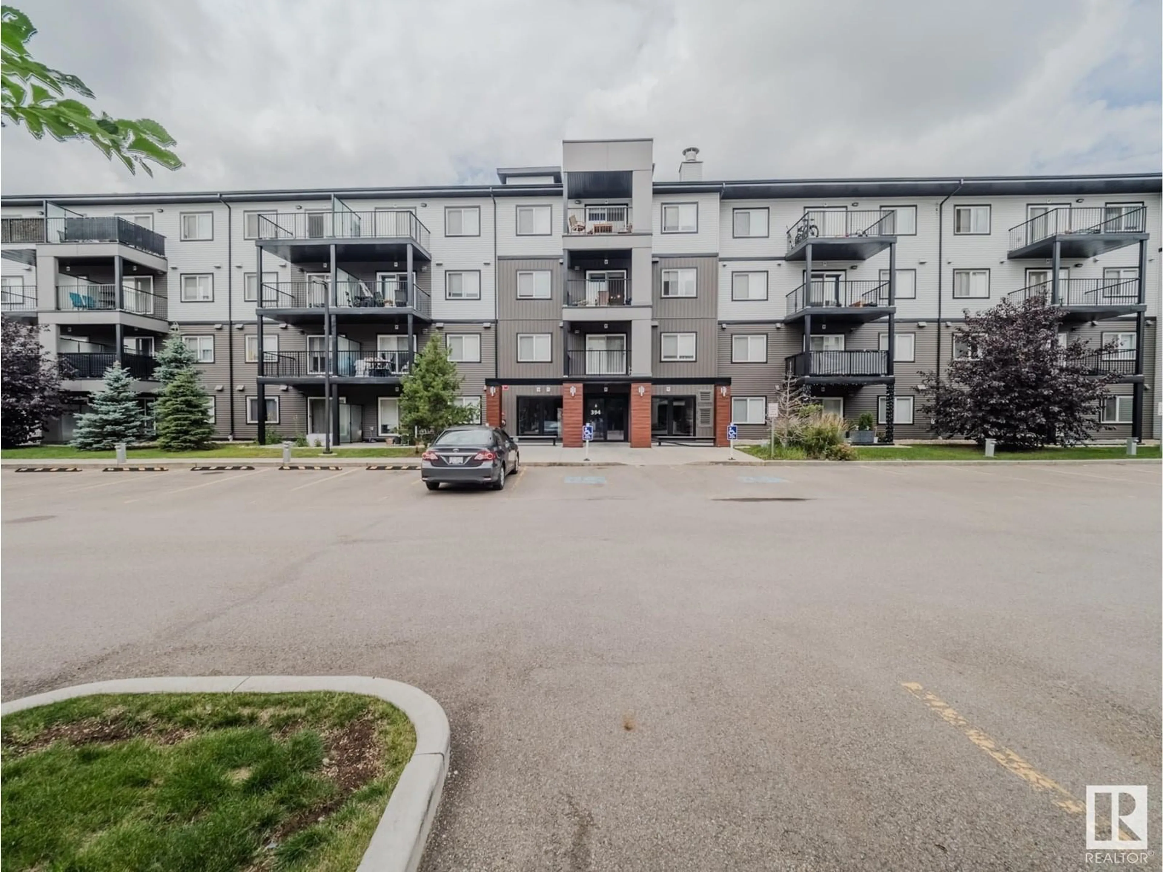 A pic from outside/outdoor area/front of a property/back of a property/a pic from drone, unknown for #310 - 394 WINDERMERE RD, Edmonton Alberta T6W2P2