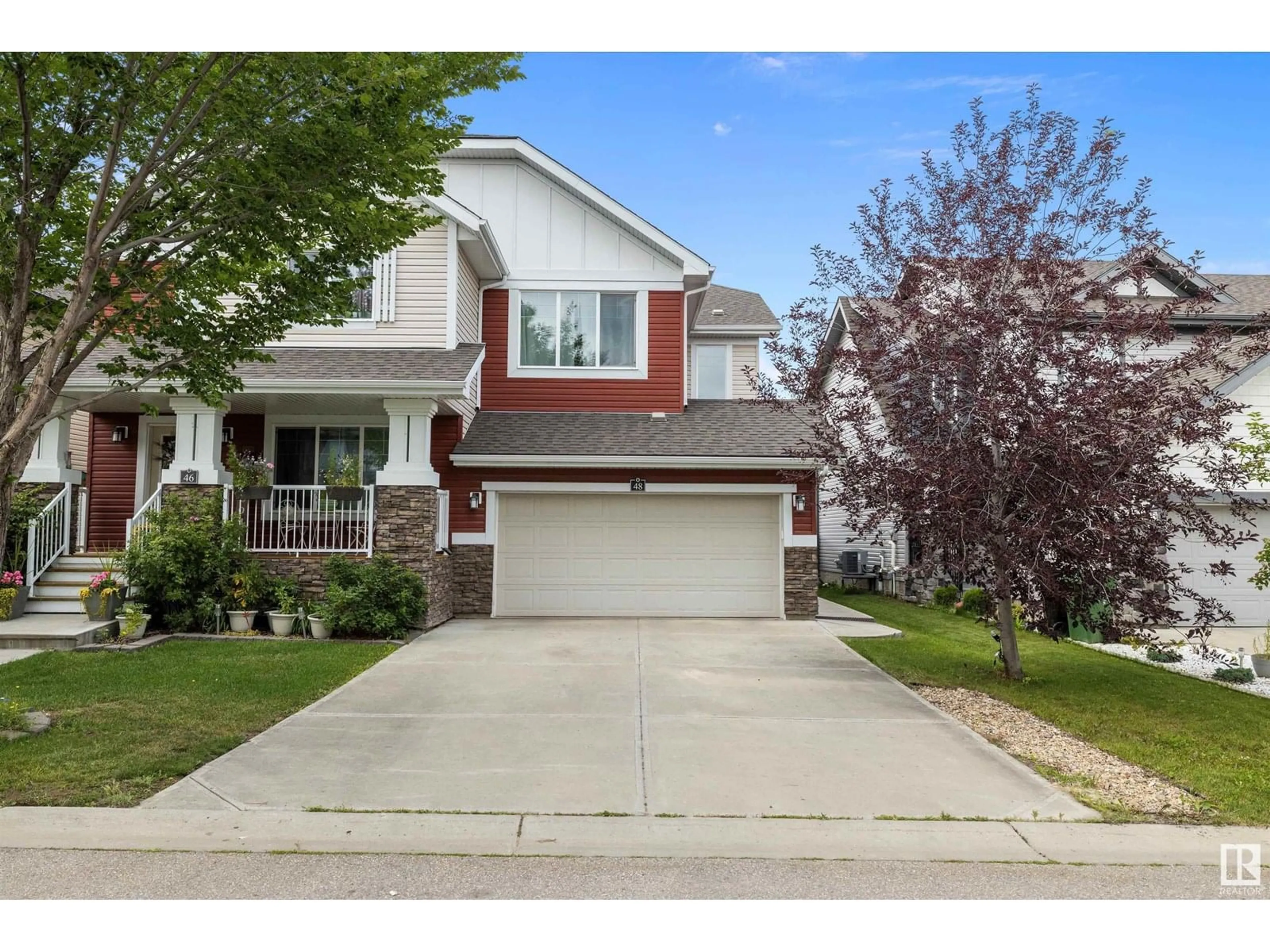 Home with vinyl exterior material, street for 48 SIERRA WD, Fort Saskatchewan Alberta T8L0T3