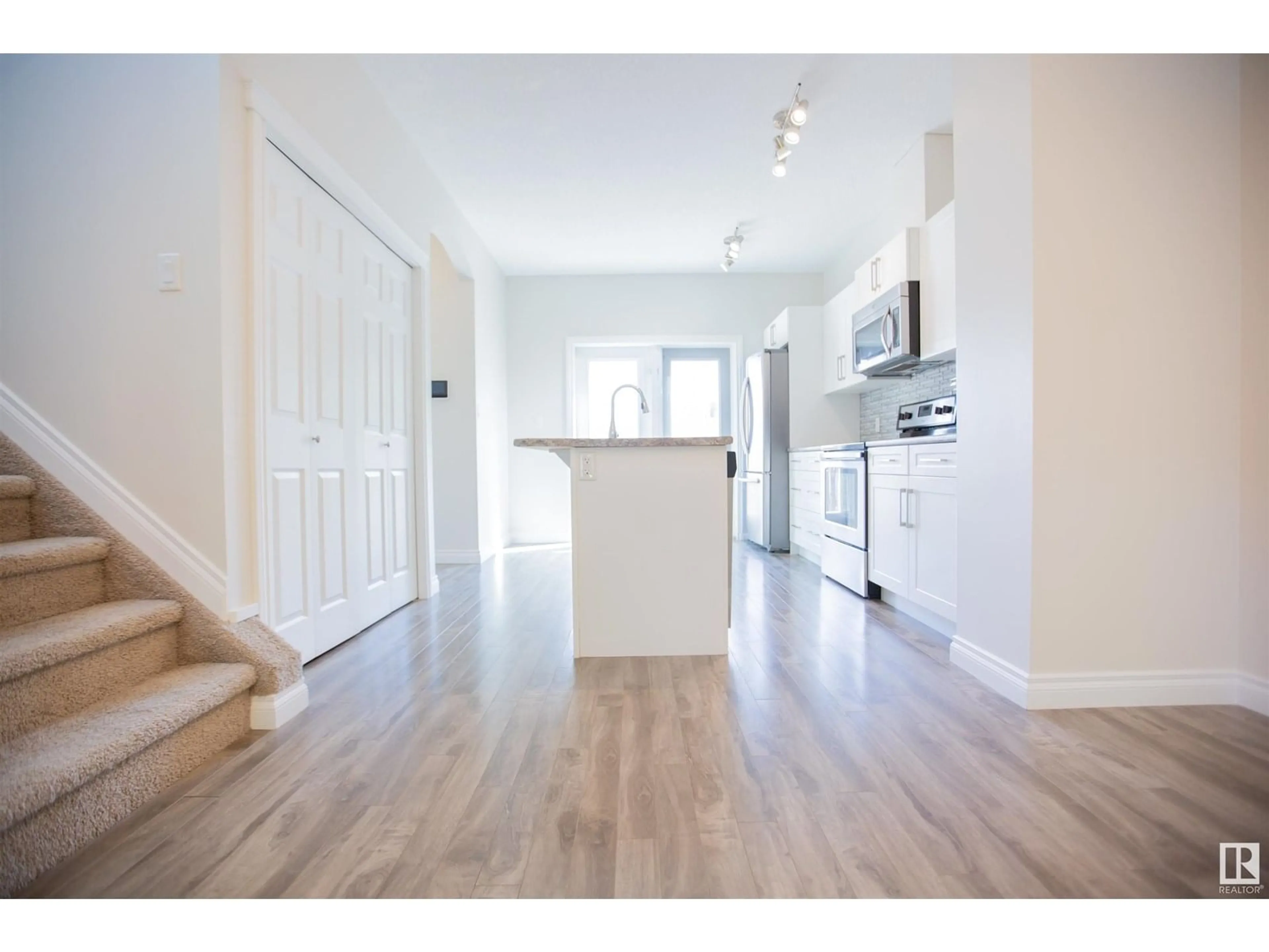 Open concept kitchen, unknown for NW - 11215 125 ST, Edmonton Alberta T5M0M6