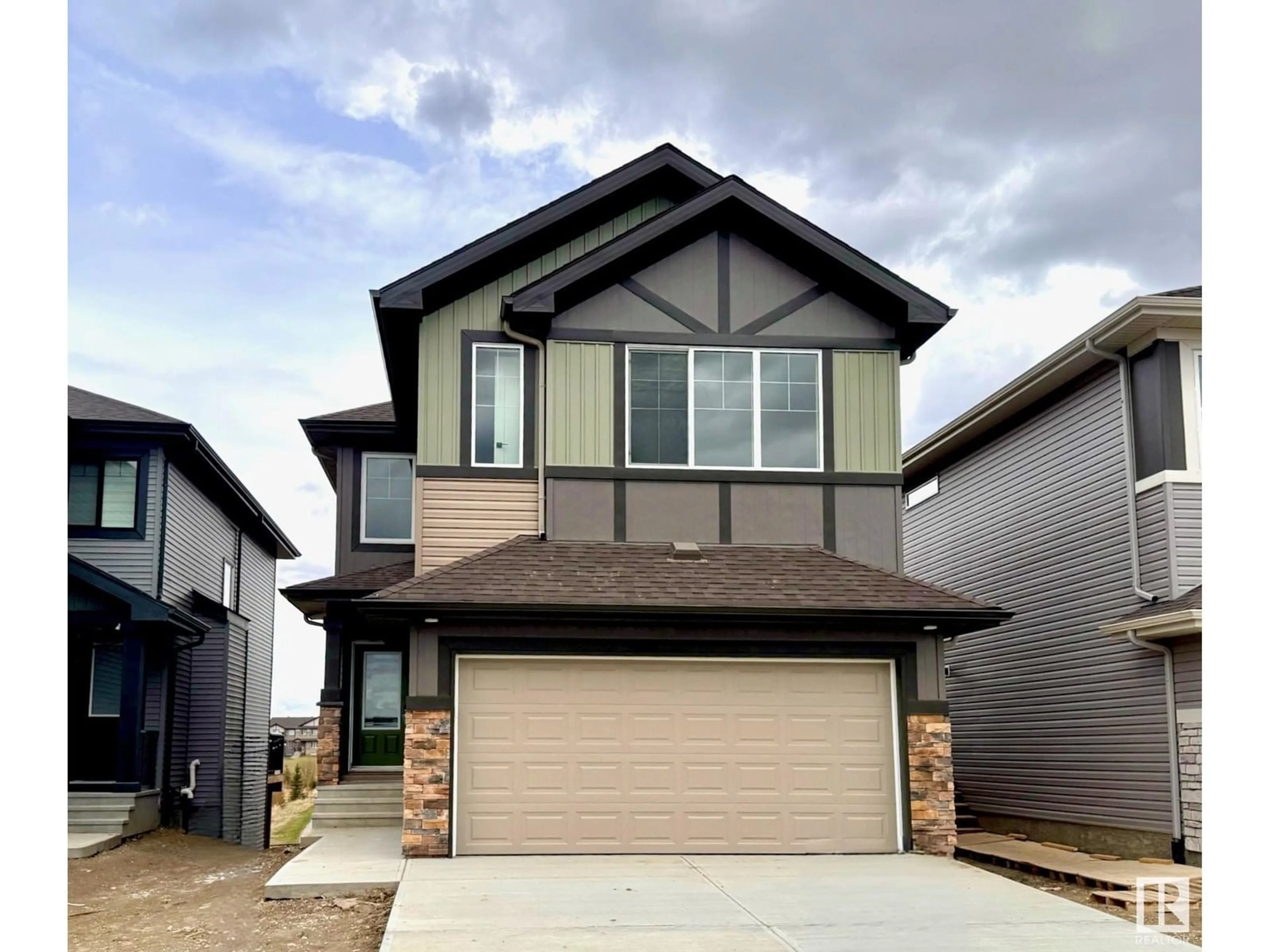 Home with vinyl exterior material, street for NW - 1519 26 ST, Edmonton Alberta T6T2T7