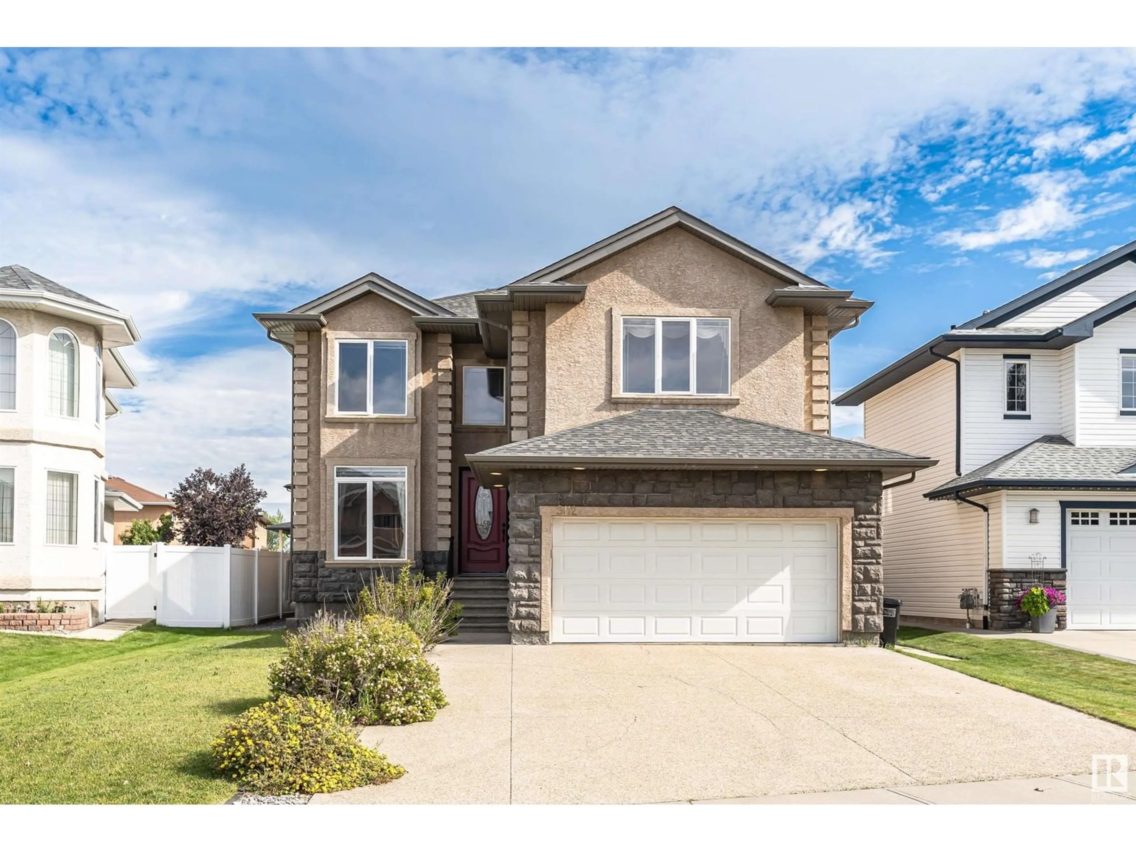 Home with vinyl exterior material, street for 9112 159 AV, Edmonton Alberta T5Z3X2